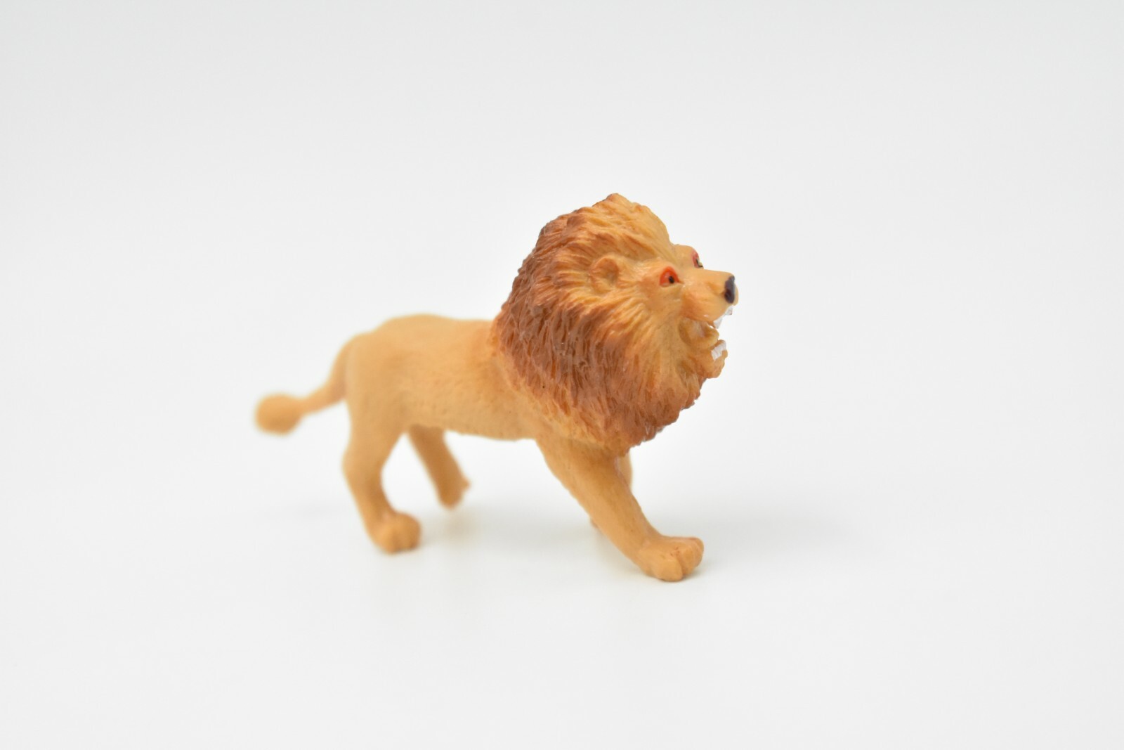 Lion, Small Plastic Animal 2 7/8 inches 1 1/2 inches tall – F3550 B17