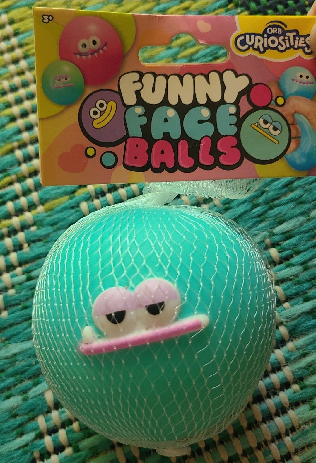 1-ORB Curiosities Funny Face Balls Tactile Squeeze Ball Toy Blue/Teal Ages 3-4