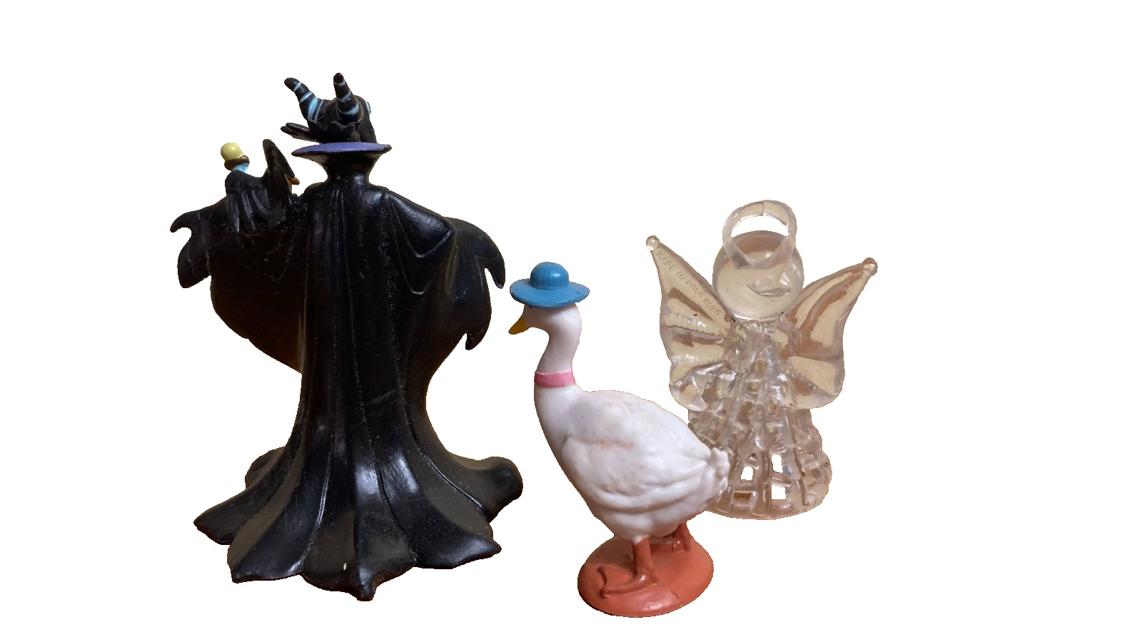 Dozen sand tray figure miniatures address ideas of childhood, danger, and safety