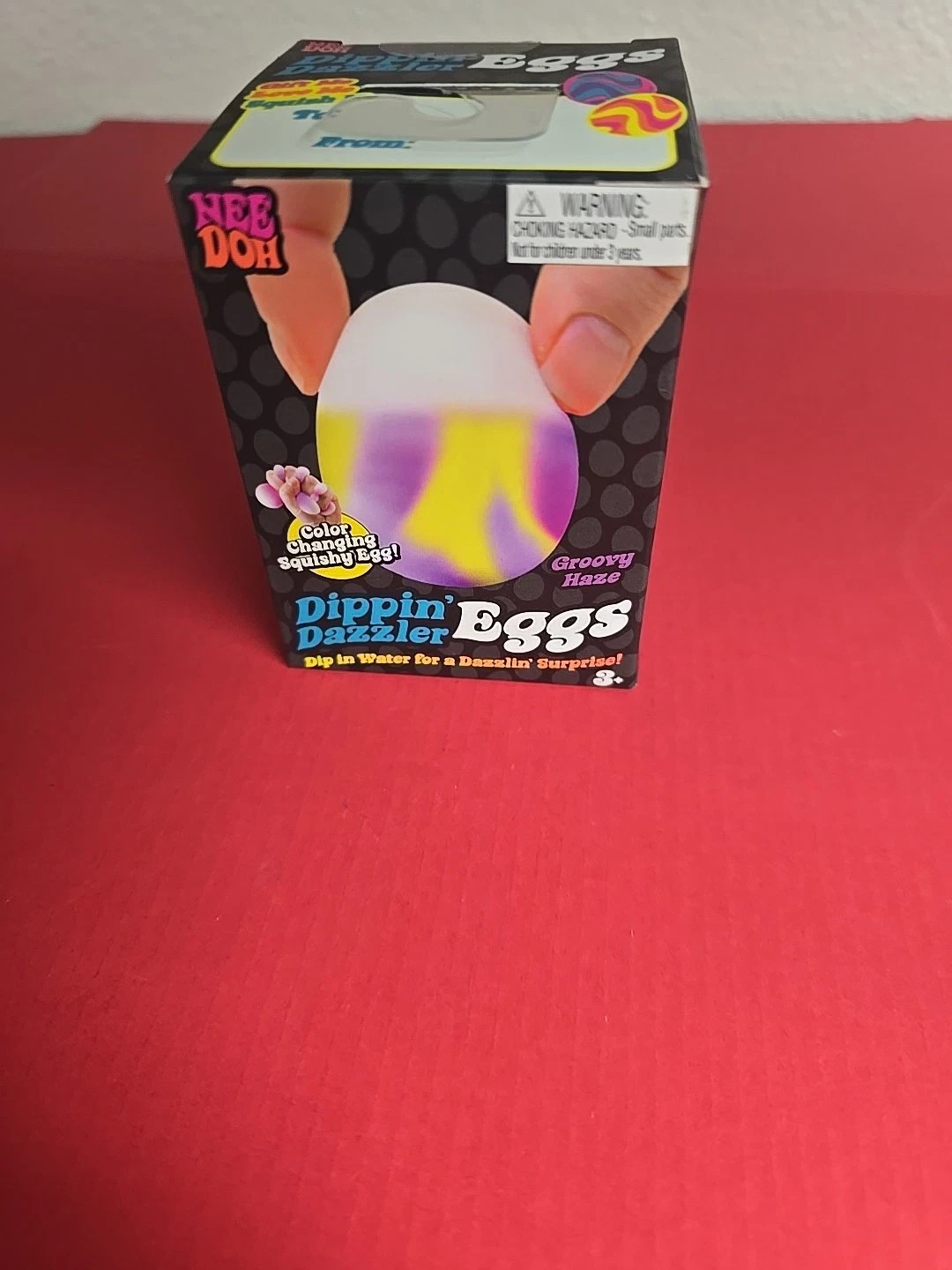NeeDoh Dippin’ Dazzler Egg, Easter Nee Doh Color Changing Squish Yellow & Purple