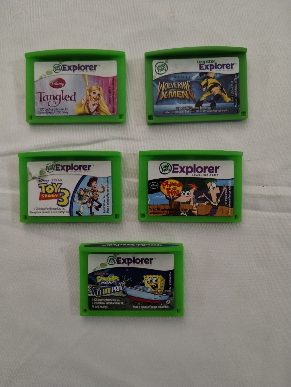 Lot of 5 Leap Frog, LeapPad Explorer,Games (Tangled, Toy Story 3, Wolverine X)