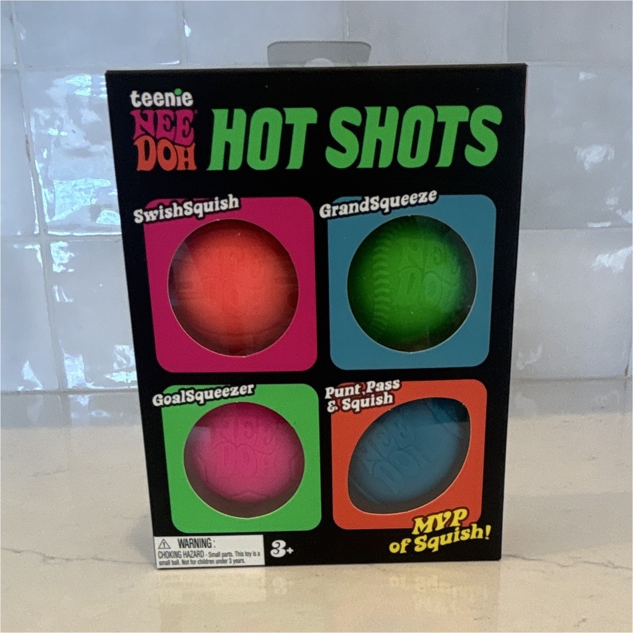Nee Doh Hot Shots Teenie Set of 4 Squishy Squeeze Balls, Multicolor