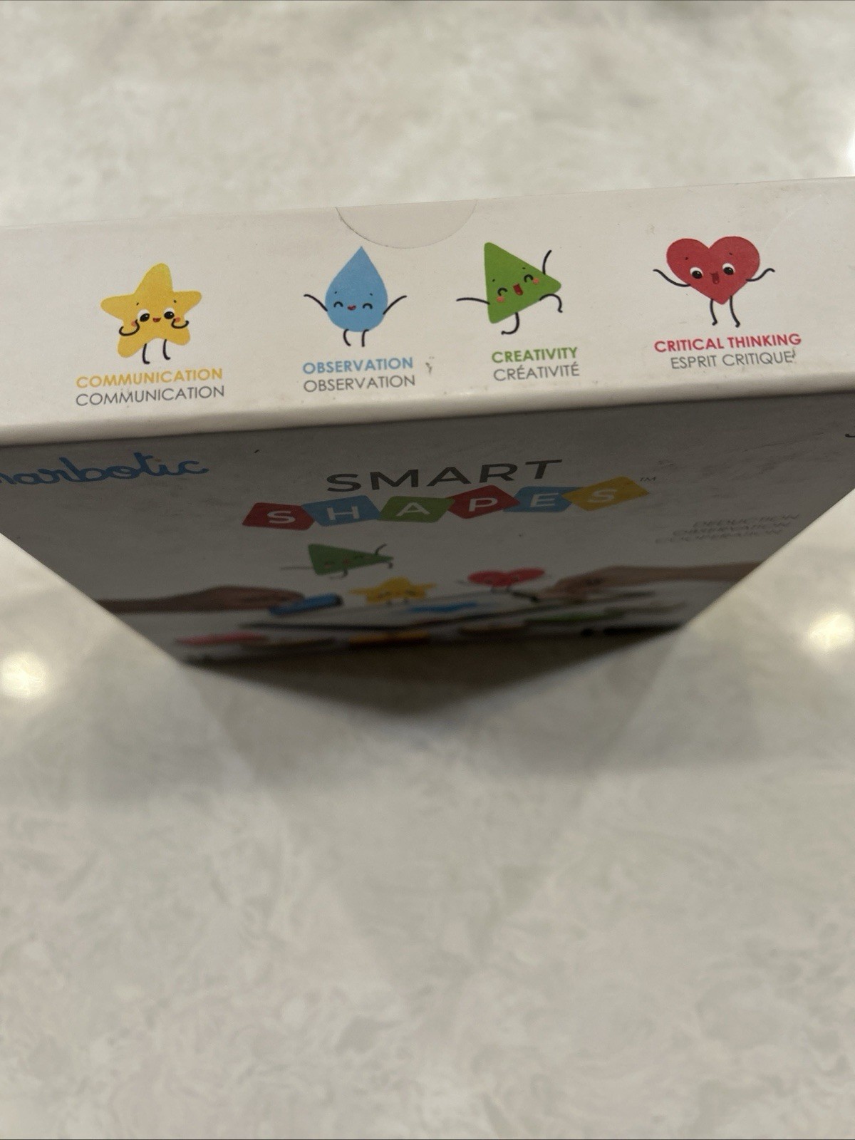 Marbotic Smart Shapes interactive learning toy with physical wooden shapes.