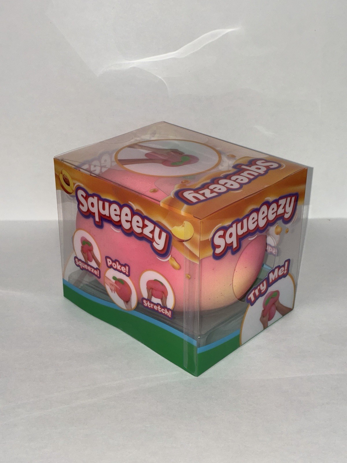 Squeeezy Peach Squishy Stress Ball Tactile Squeeze Toy In Box