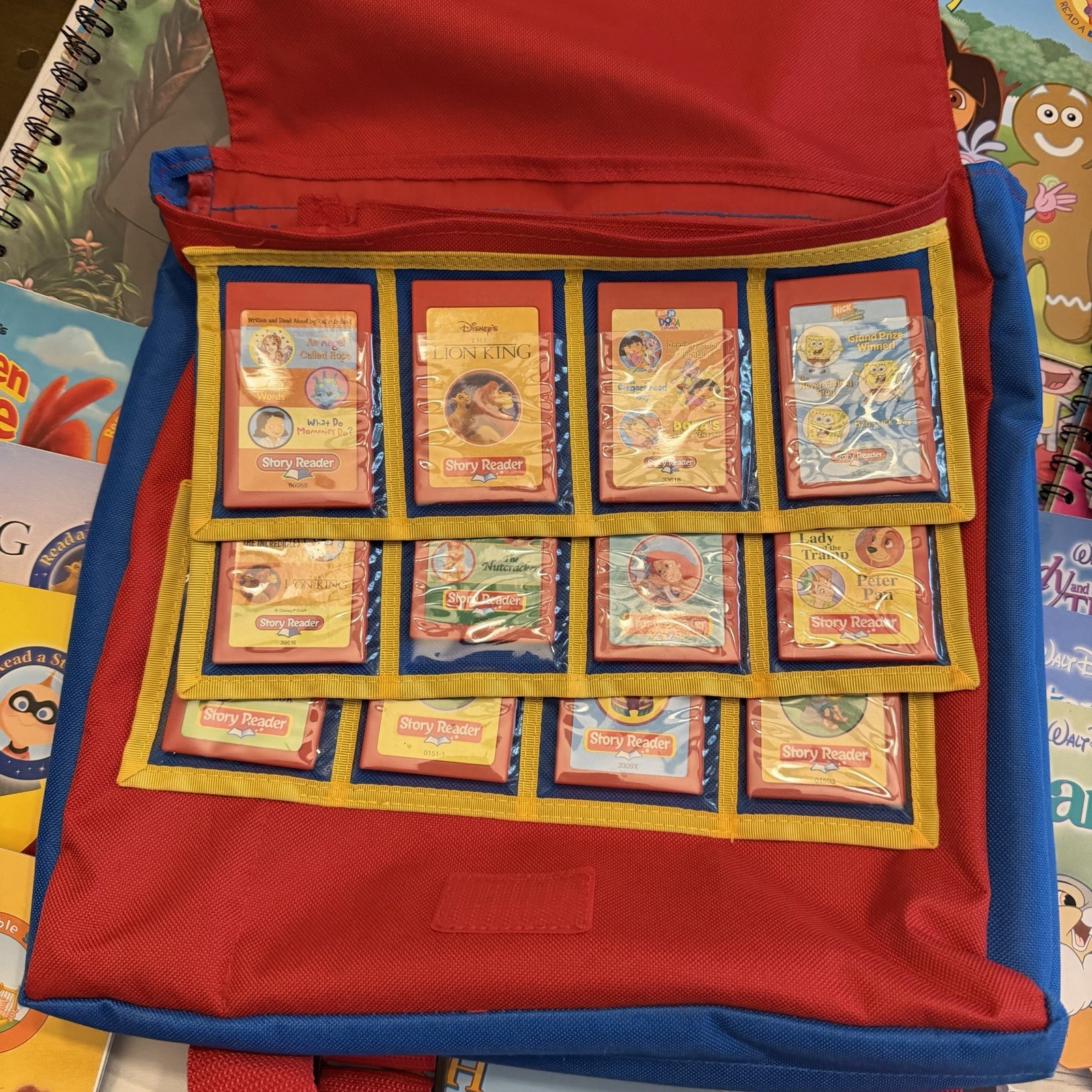 Children’s Story Reader System Lot- 24 Books, 12 Cassettes, and Backpack