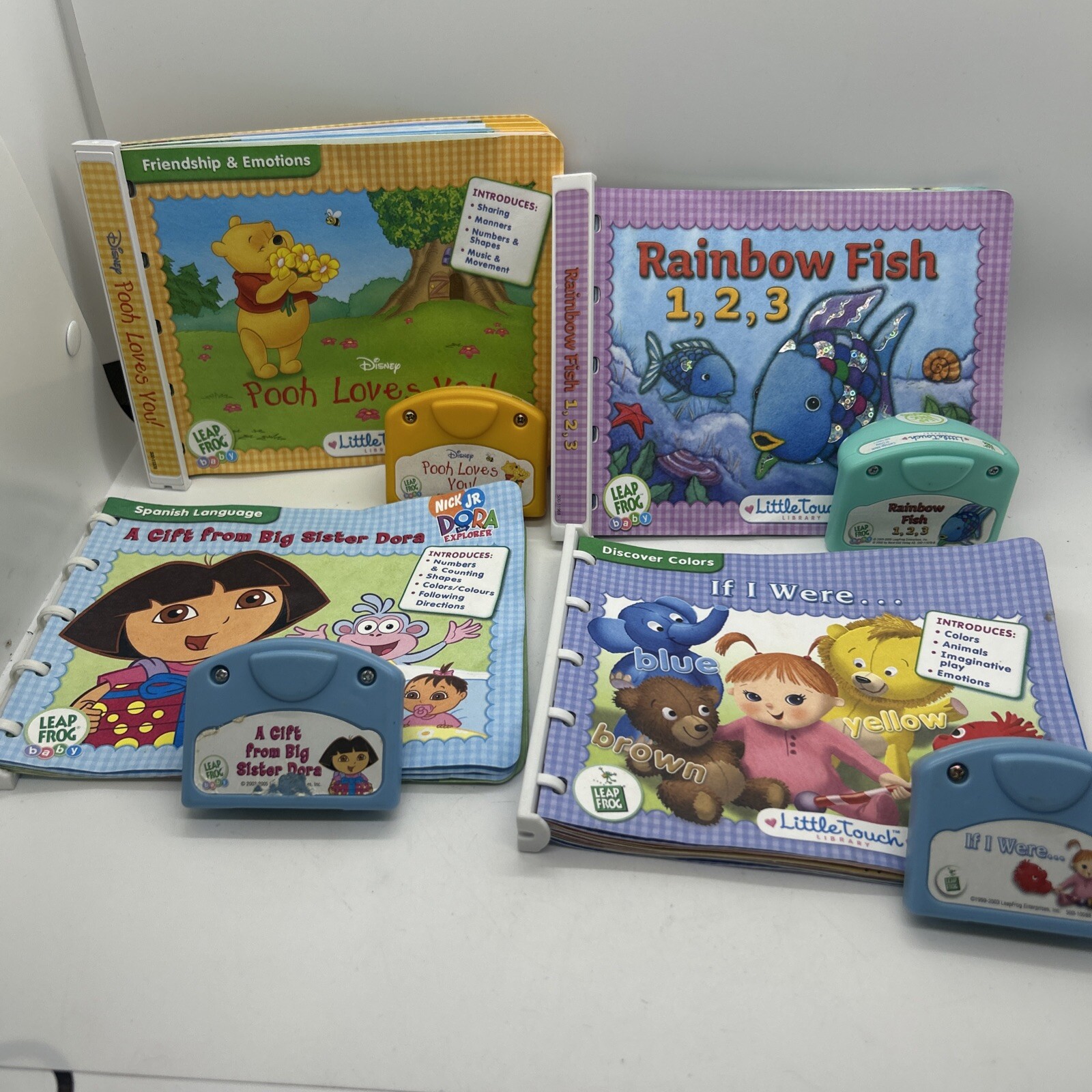 Leap Frog Baby 4 Pack Dora, Rainbow Fish, Disney Pooh, & If I Were Books & Cartr