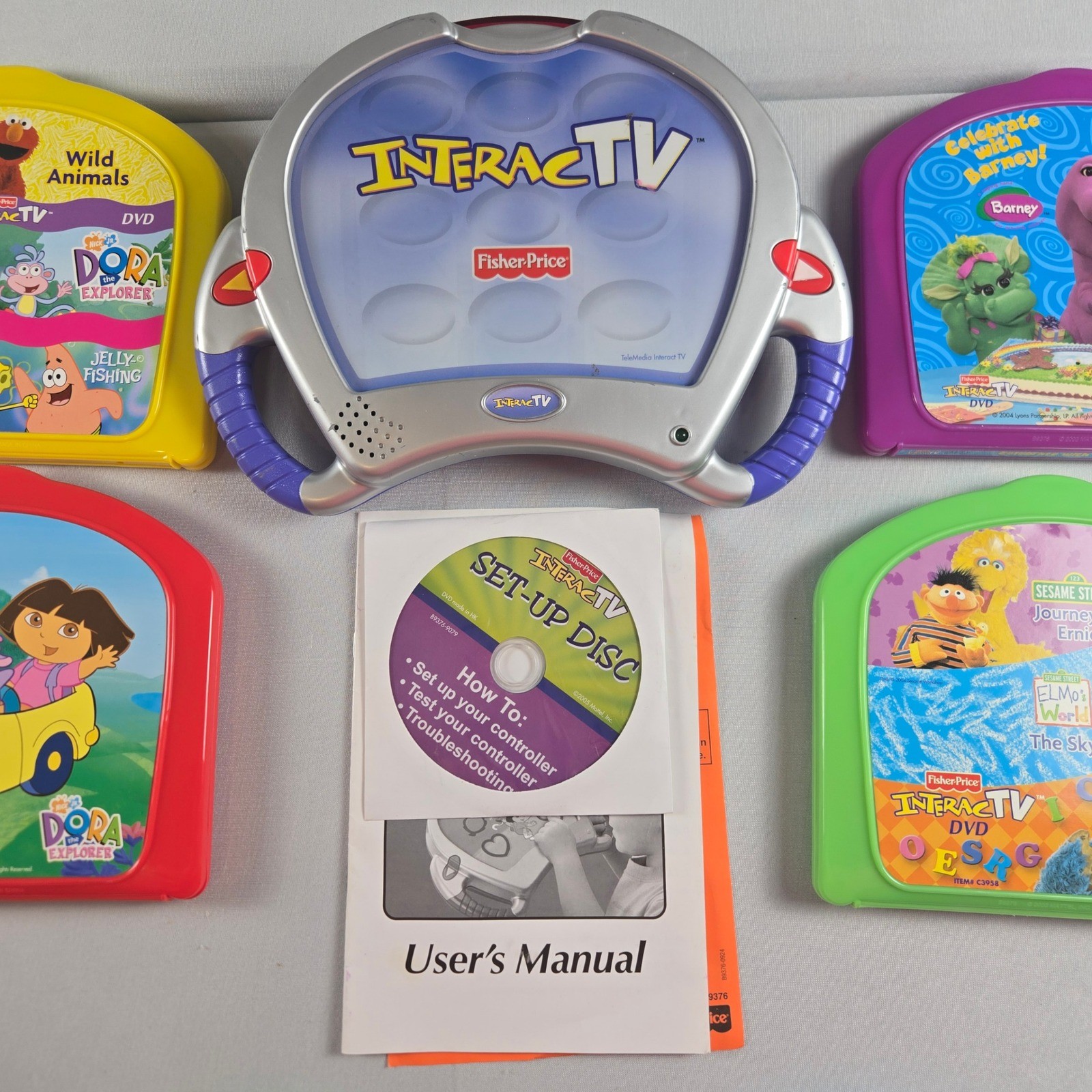 Fisher Price InteracTV Learning System Bundle 6 Games Blue’s Clues Dora Barney