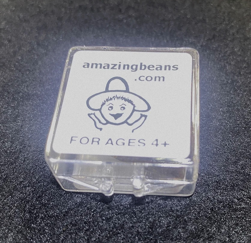 15 Mexican Jumping Beans. 3 Cases With 5 Beans In Each Case & Racing Game