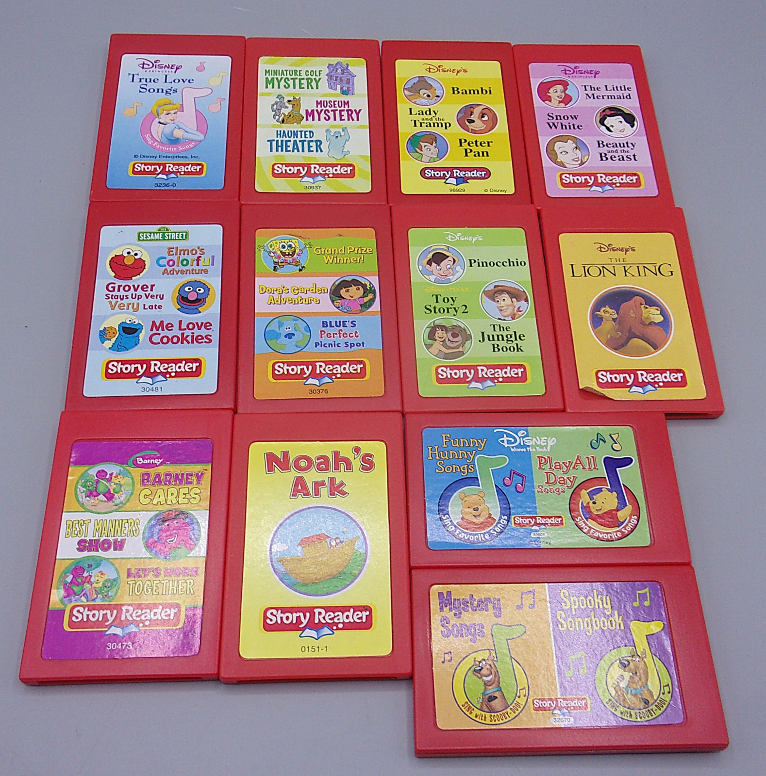 Story Reader Cartridges Lot of 12 Disney Sesame Pooh Scooby Barney