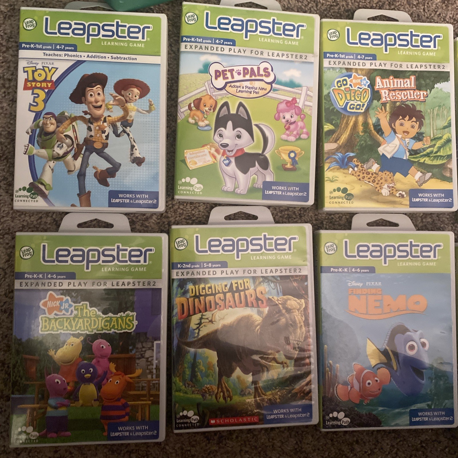 Leap Frog Leapster 2 Handheld Game, With 9 Games, Pre-Owned No Power Cord Works