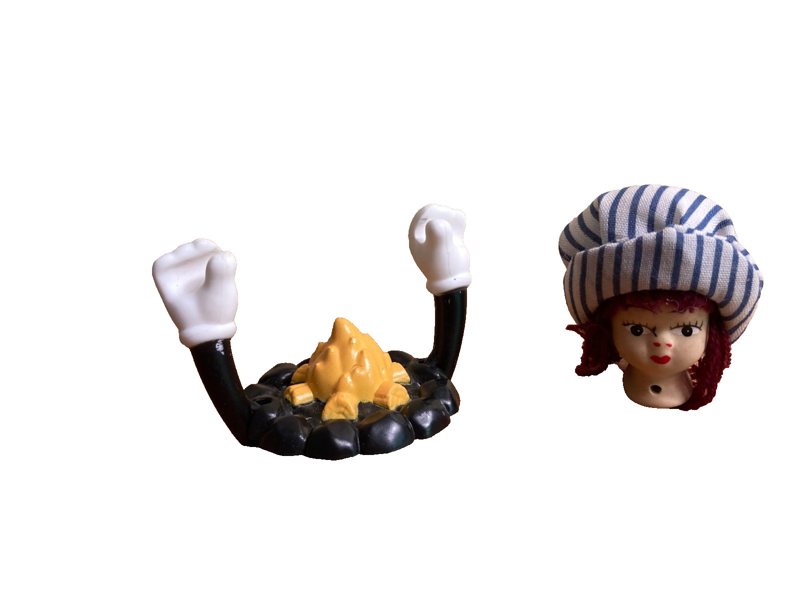 Dozen sand tray figure miniatures address ideas of childhood, danger, and safety