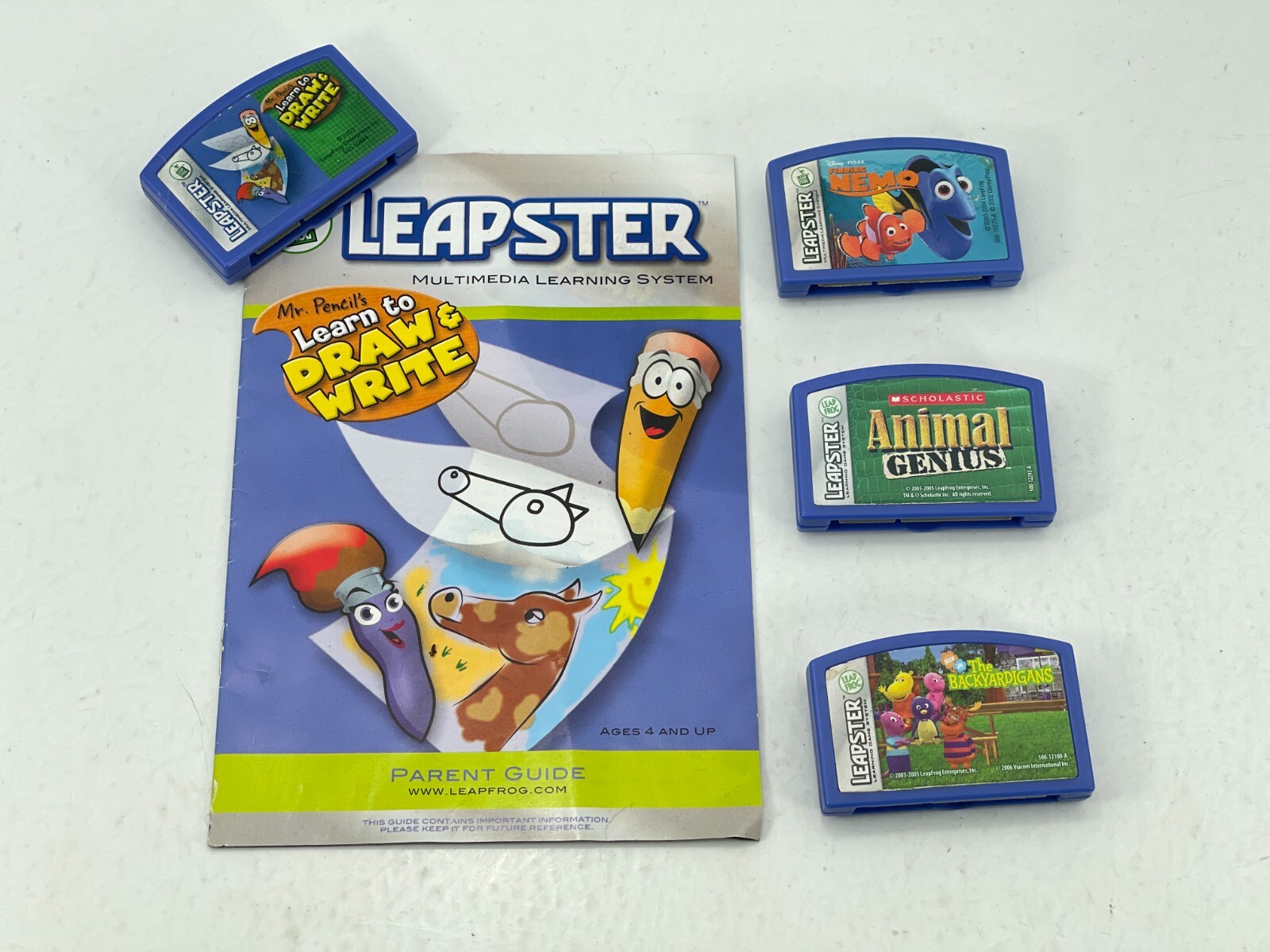 Leapster LeapFrog Finding Nemo Draw Write Animal Genius Backyardigans 4 Game Lot