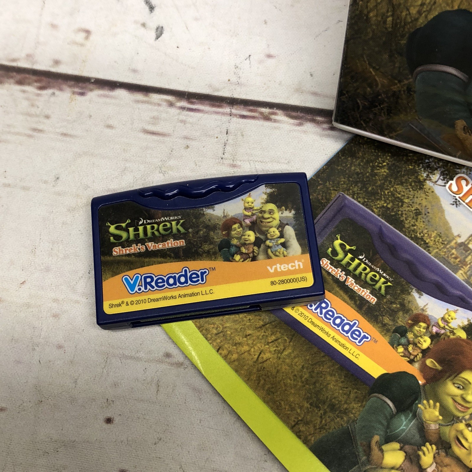 Vtech V.Reader Shrek’s Vacation Game With Case And What’s That Noise Cartridge
