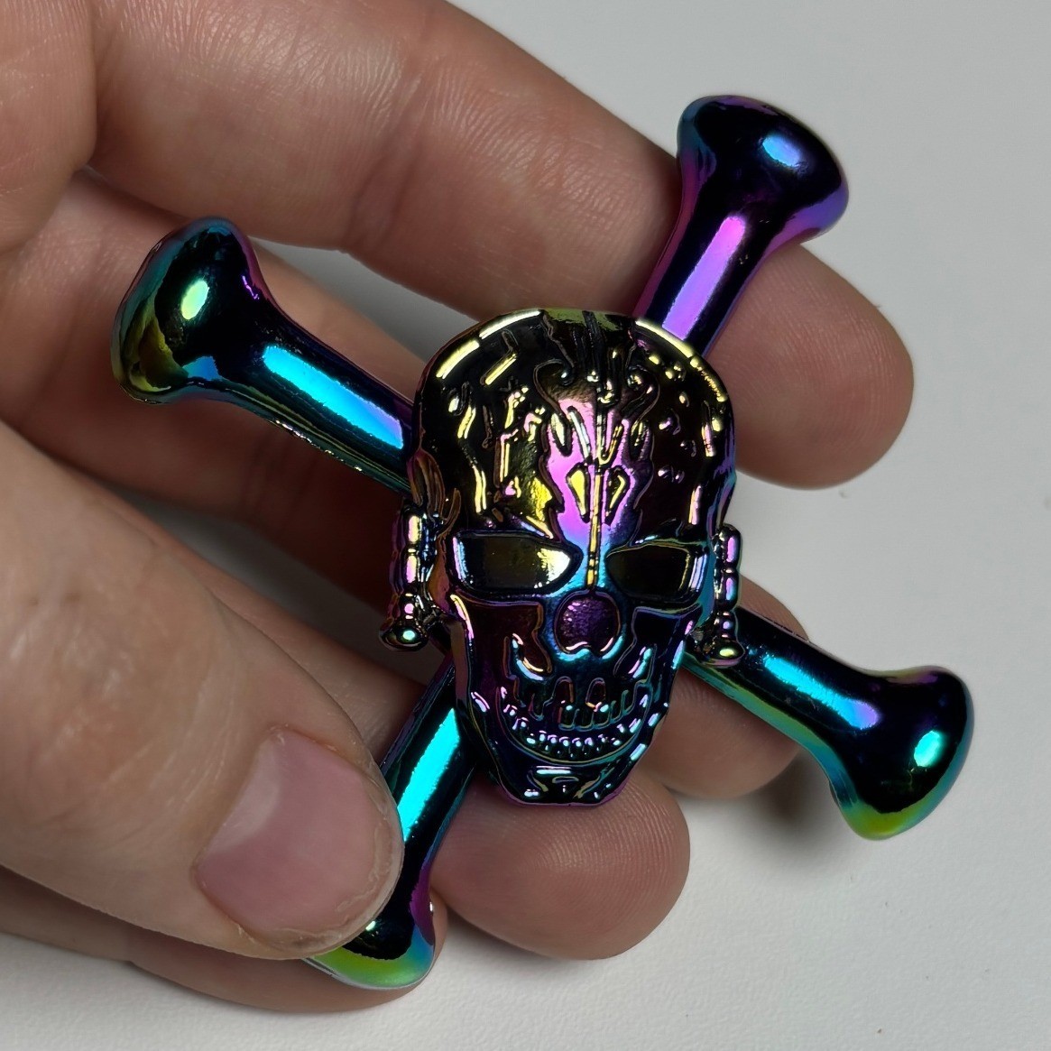 Iridescent Skull and Crossbones Metal Fidget Spinner Rainbow Oil Slick Finish