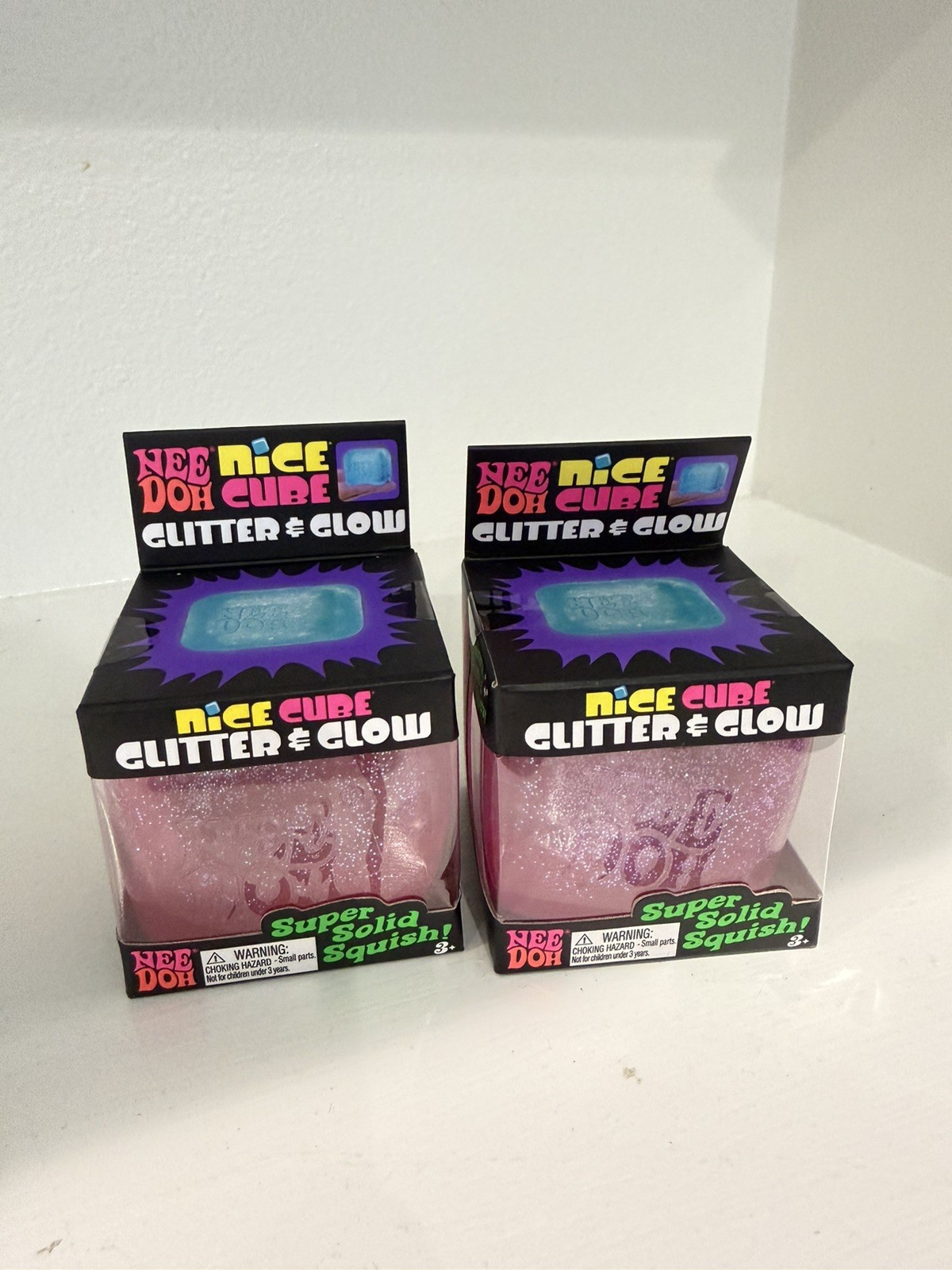 Lot of 2 NeeDoh Nice Cube Glitter and Glow Nee Doh Ice Cube Pink New
