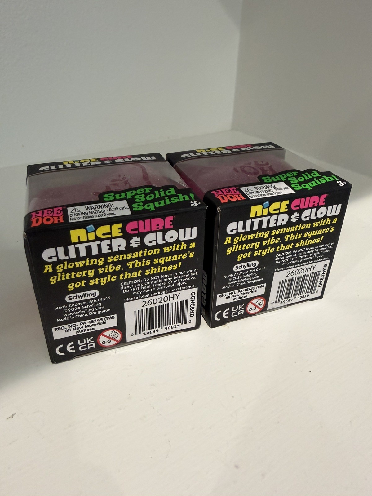 Lot of 2 NeeDoh Nice Cube Glitter and Glow Nee Doh Ice Cube Pink New