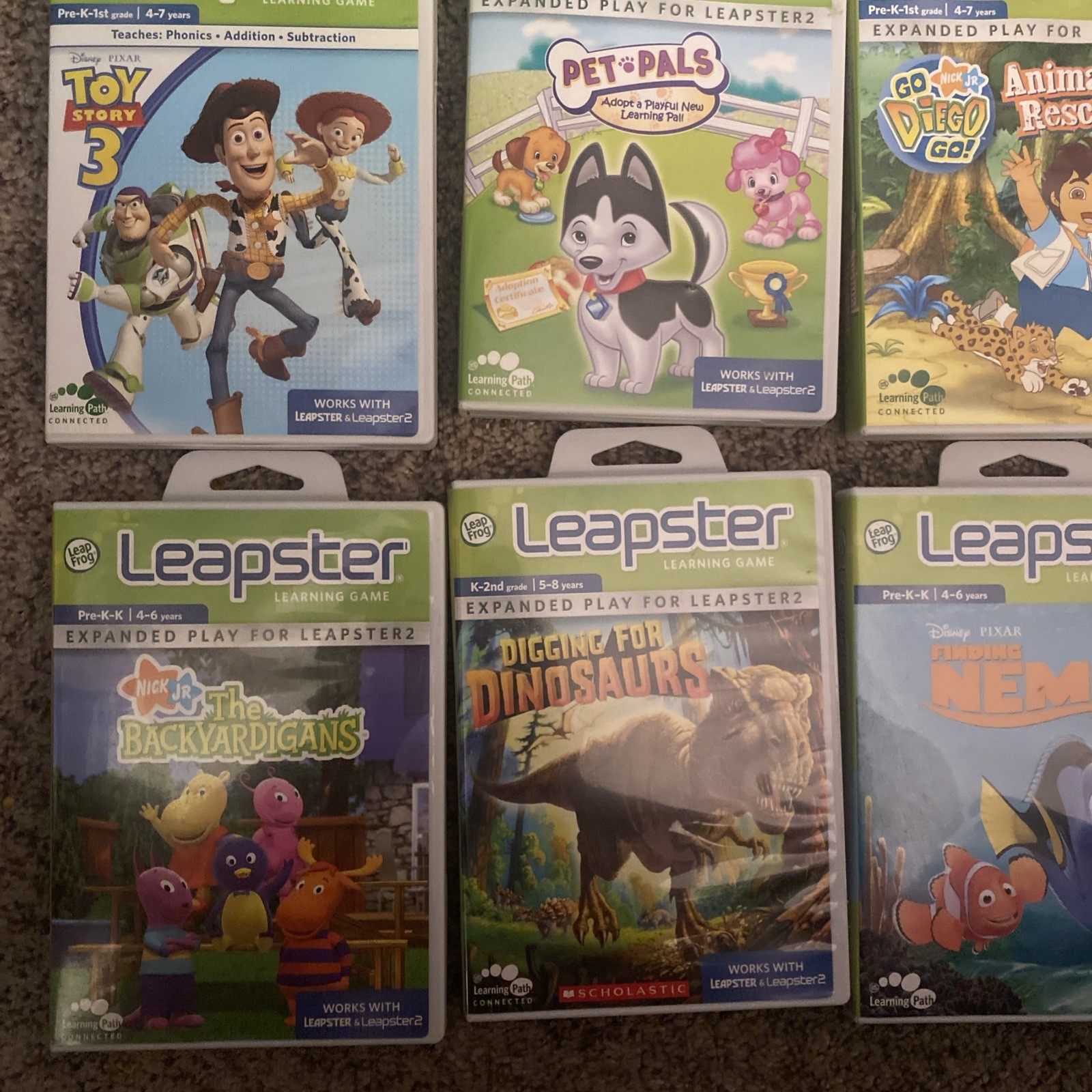 Leap Frog Leapster 2 Handheld Game, With 9 Games, Pre-Owned No Power Cord Works