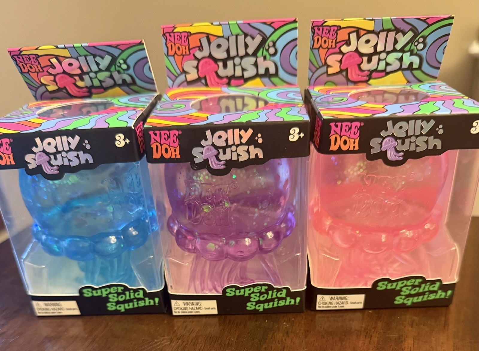 NeeDoh Nee Doh Jelly Squish Super Authentic Jelly Fish Lot Of 3 Pink Blue Purple