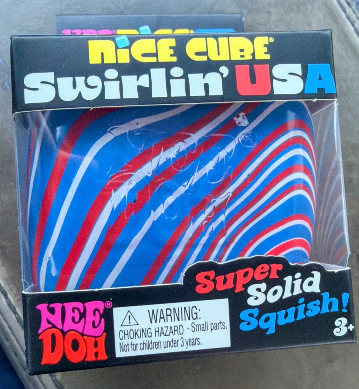 Nee Doh Nice Cube Swirlin’ USA Super Solid Squish Squeeze Toy Blue/Red/White 3+