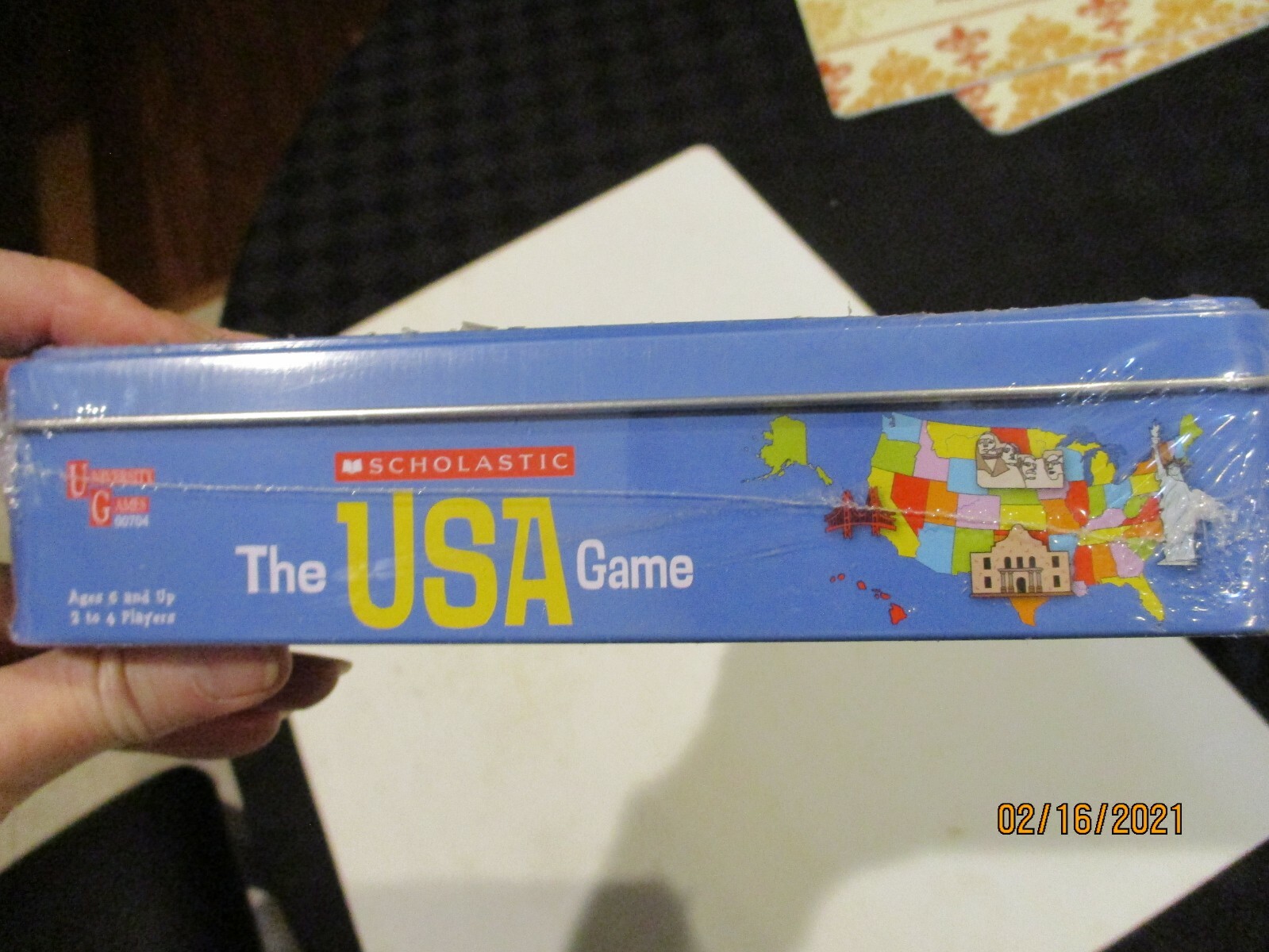 The USA Game Scholastic new in tin sealed University Games