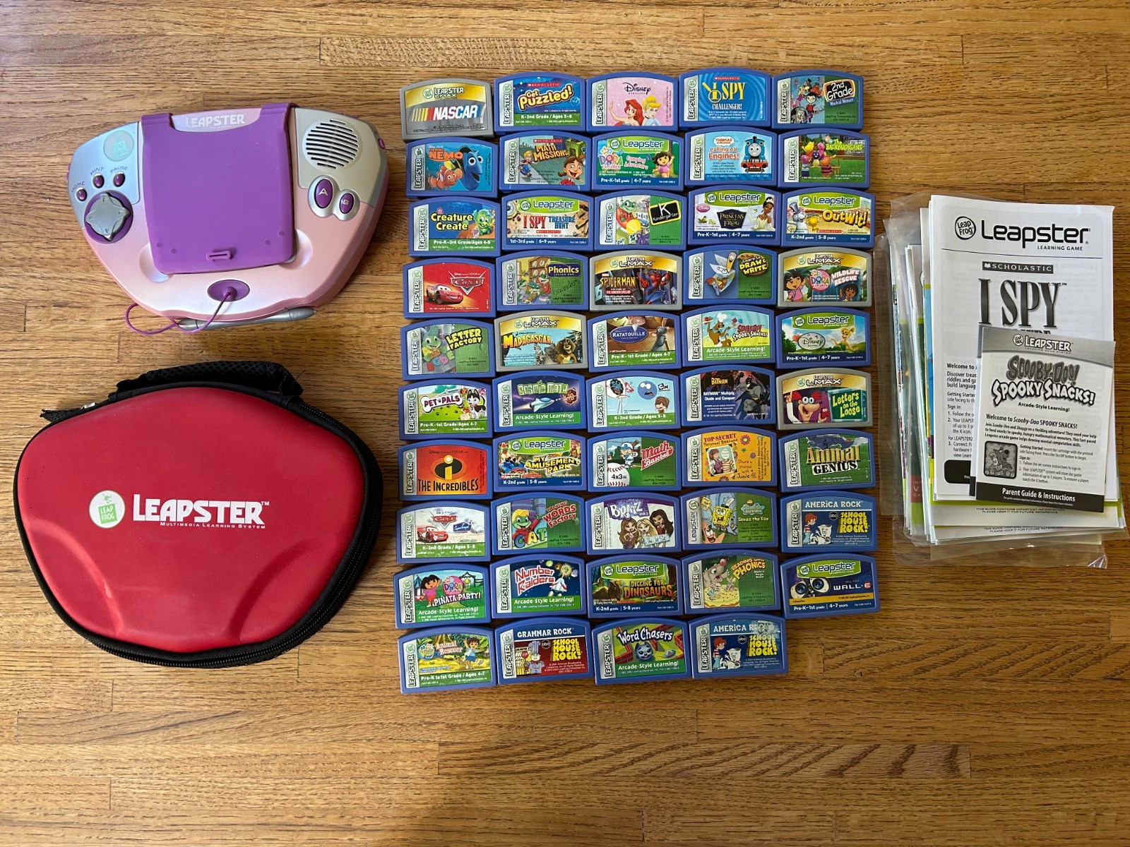 EUC LeapFrog LEAPSTER Learning Game System Lot Pink Console, 50 Games & Red Case