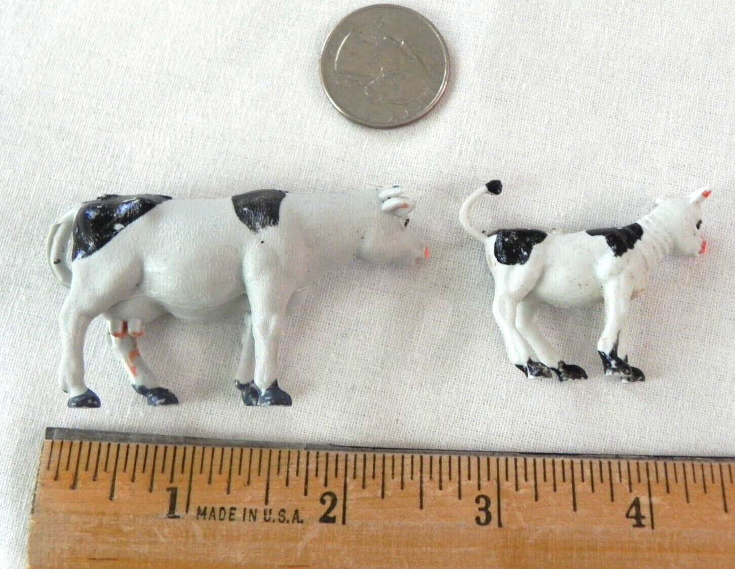 Set of 4 Holstein cows farm animals calves unknown vintage Singapore Hong