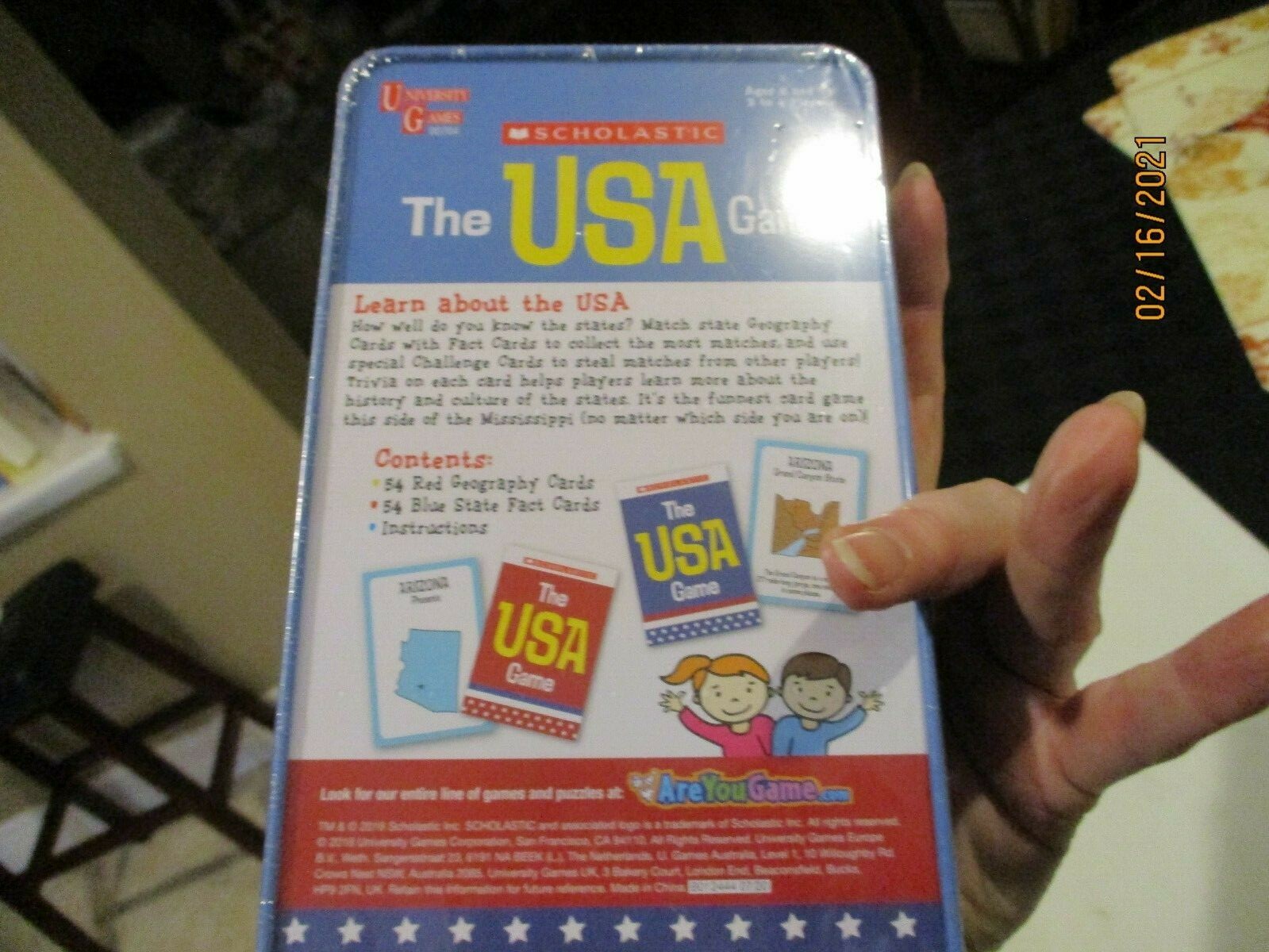 The USA Game Scholastic new in tin sealed University Games