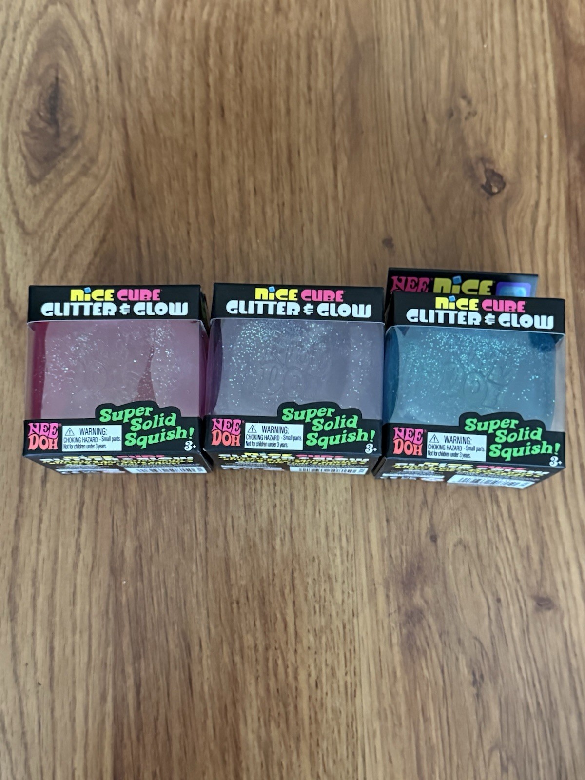 Nee Doh Nice Cube Glitter & Glow Super Solid Squish Squeezable Set Of 3