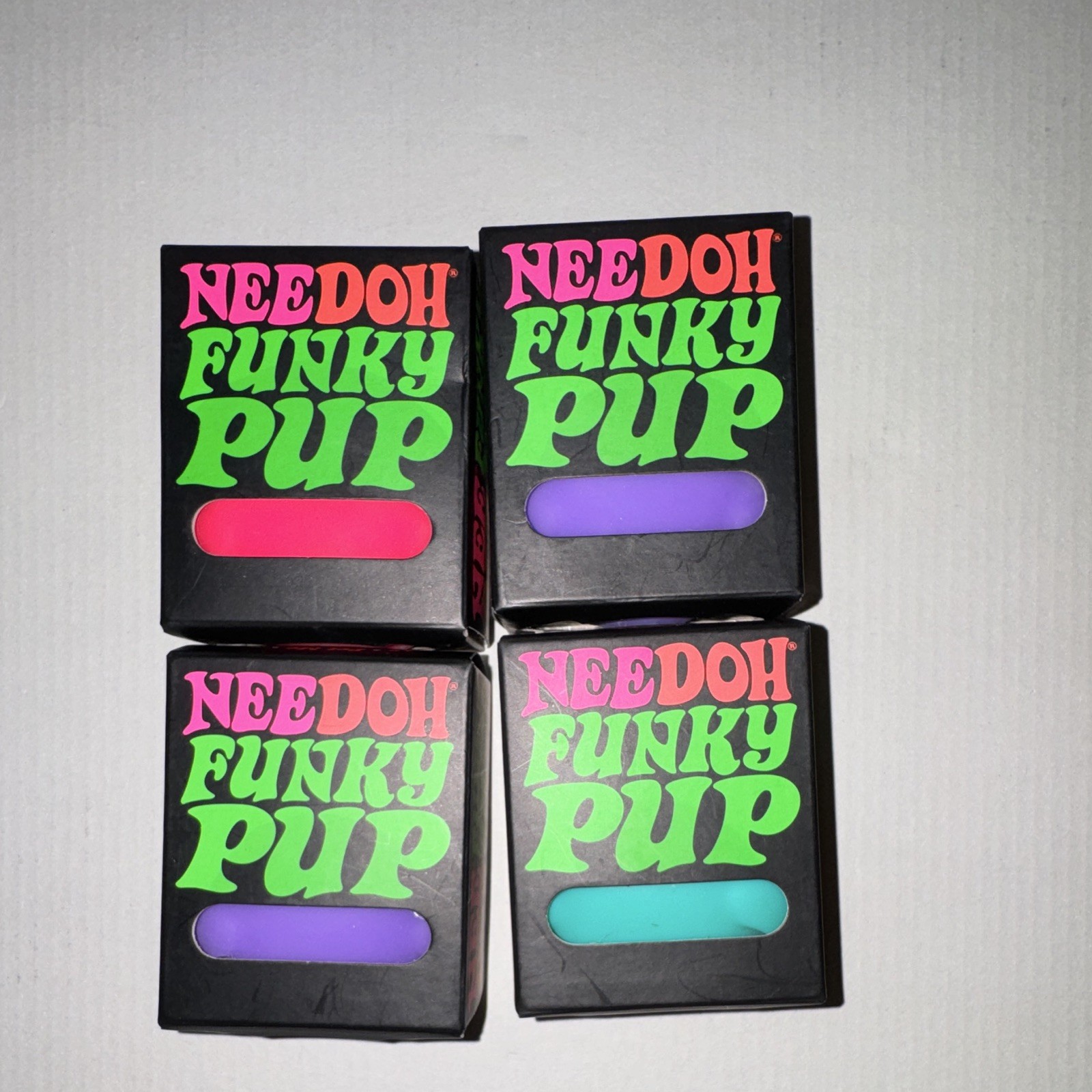Schylling NeeDoh Funky Pup Tactile Squeeze Toy, Multicolor 4 Pack, Ages 3-7