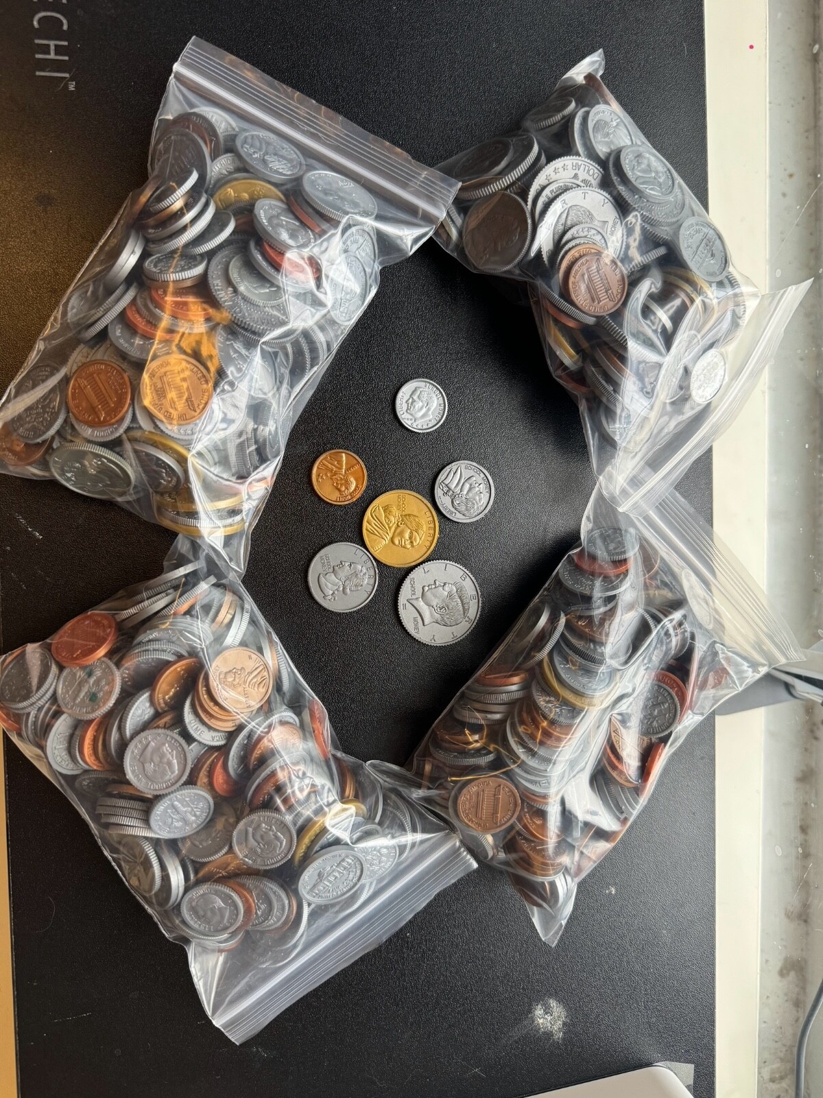 Plastic School Money; penny, nickel, dime, quarter, half-dollar, dollar coins