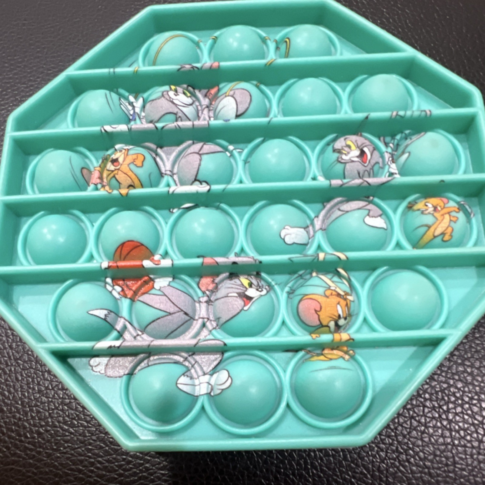 Tom and Jerry Octagon Pop It Fidget Teal Tactile Sensory Toy Ages 3-11 Years