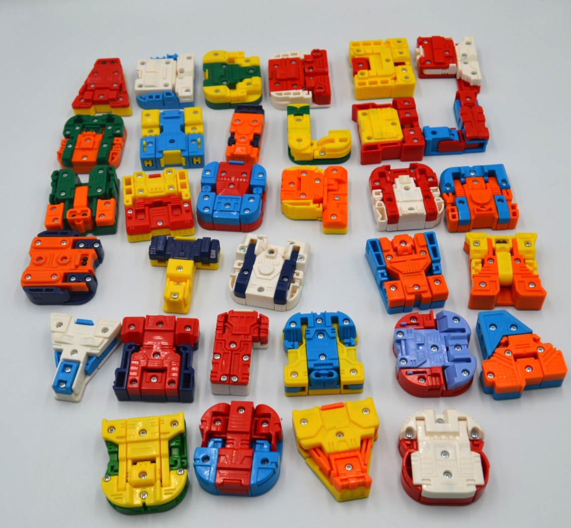 Alpha Bots Transforming Letters Numbers Robots Alphabet Vintage Learning