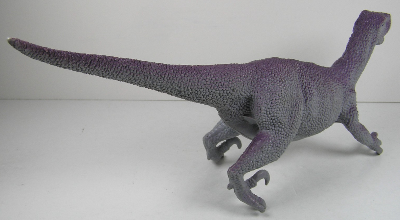 Greenbrier Gray Purple Velociraptor 9″ Long Hard Plastic Dinosaur Figure