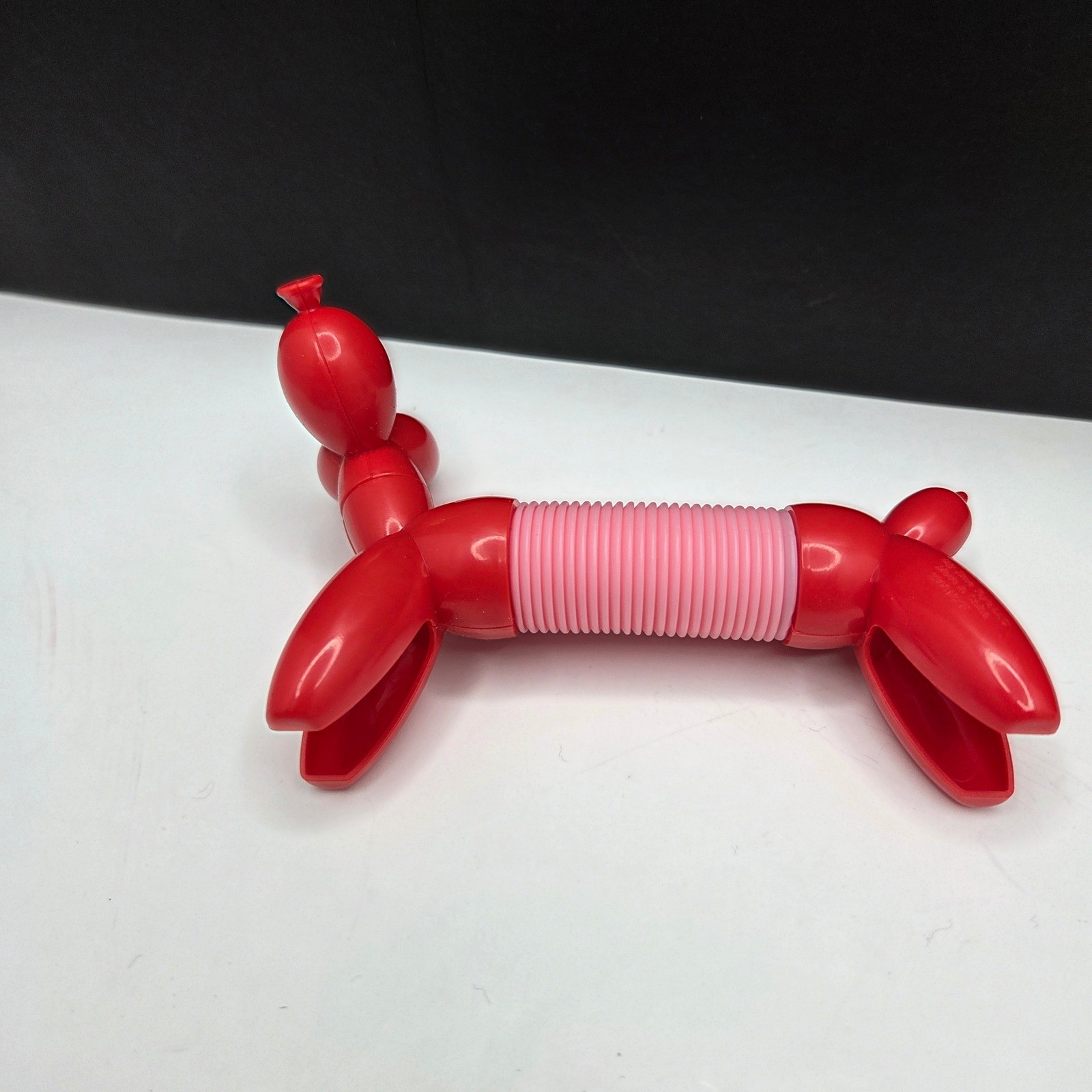 Zuru Tangle Pets Balloon Dog Fidget Toy Red Pink Expandable Sensory Toy 4-8in