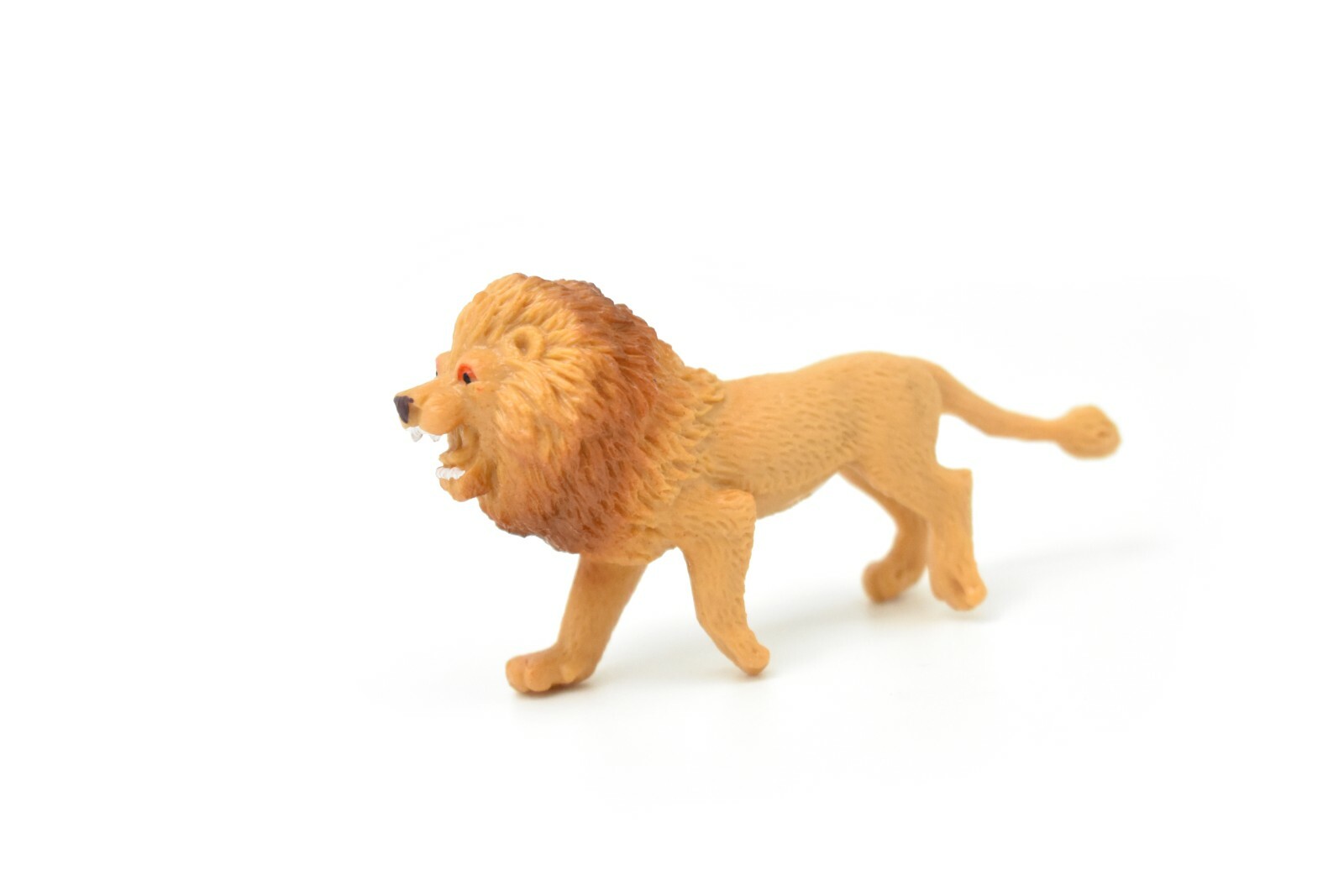 Lion, Small Plastic Animal 2 7/8 inches 1 1/2 inches tall – F3550 B17