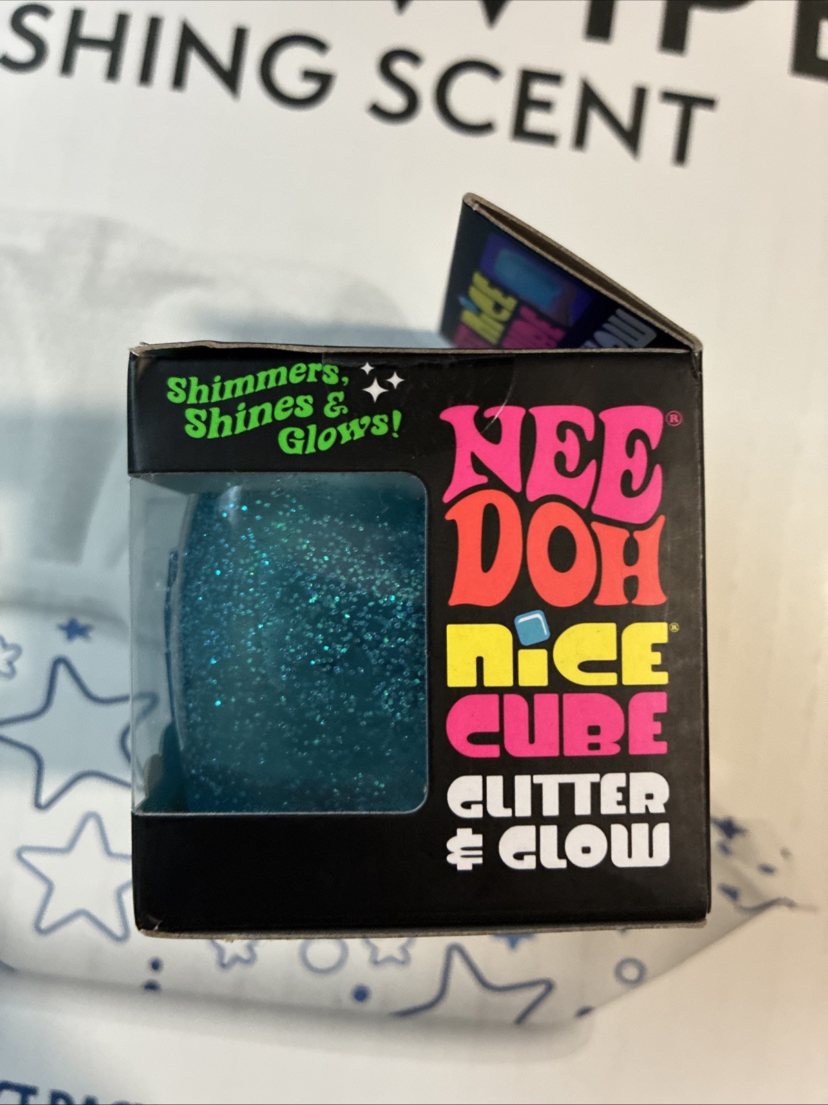 Schylling NeeDoh Nice Cube Glitter and Glow Squishy Glowing Ice Cube Blue NEW