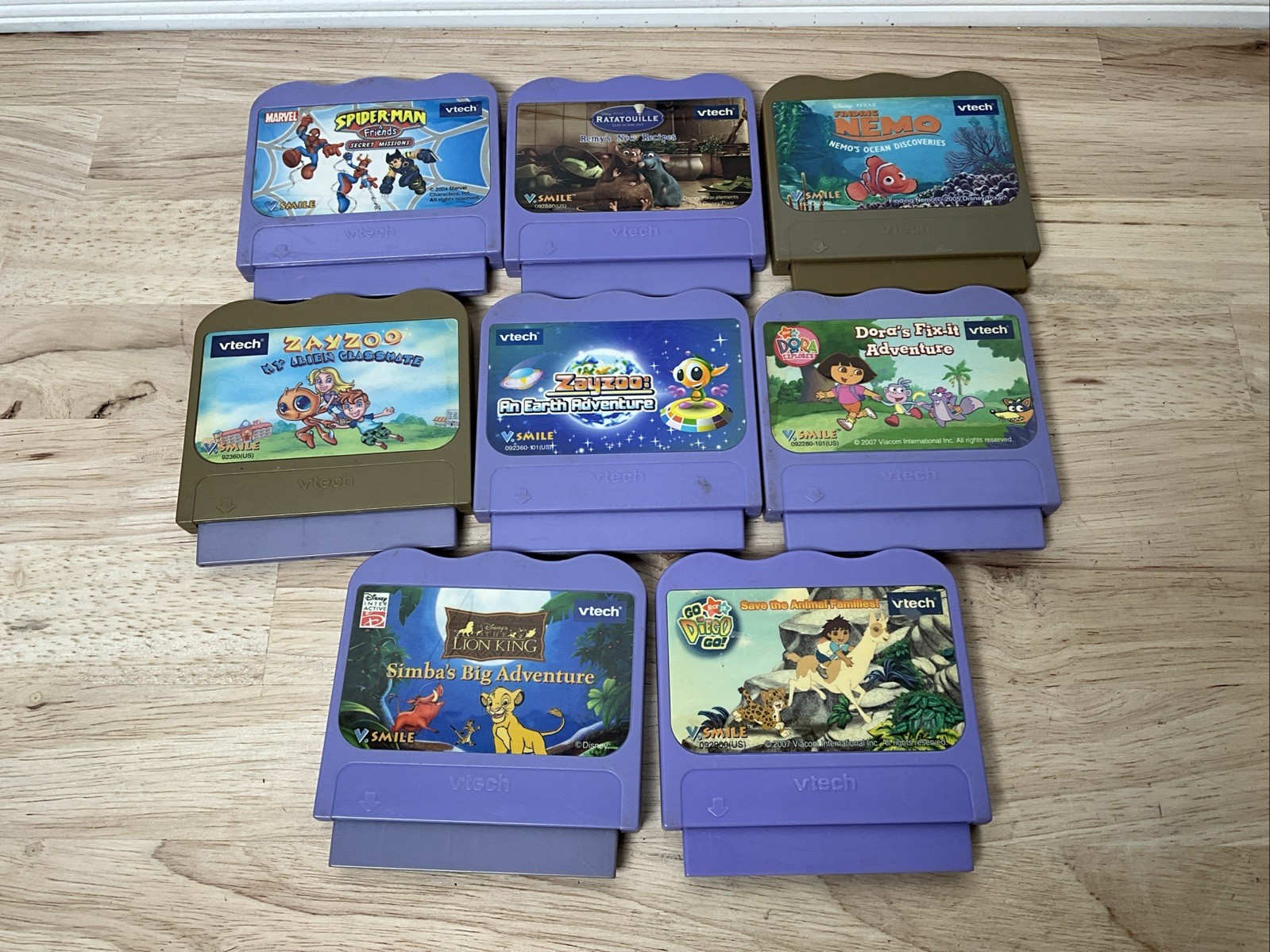 Lot of 8 V tech V Smile Cartridge Games Disney Lion King, Spider-Man, Remy, Dora