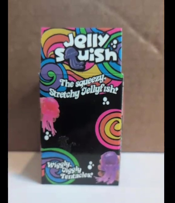 JELLY SQUISH Yellow squeezy stretchy Jellyfish with wiggly tenacles