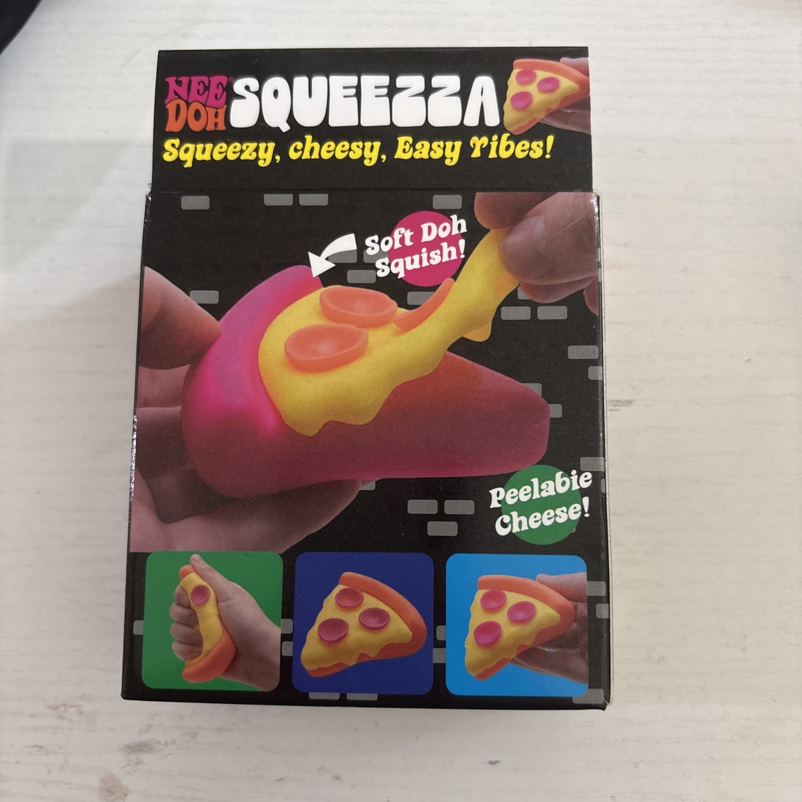 Schylling NeeDoh Squeezza Pizza Slice Peelable Cheese Squish Toy New Box