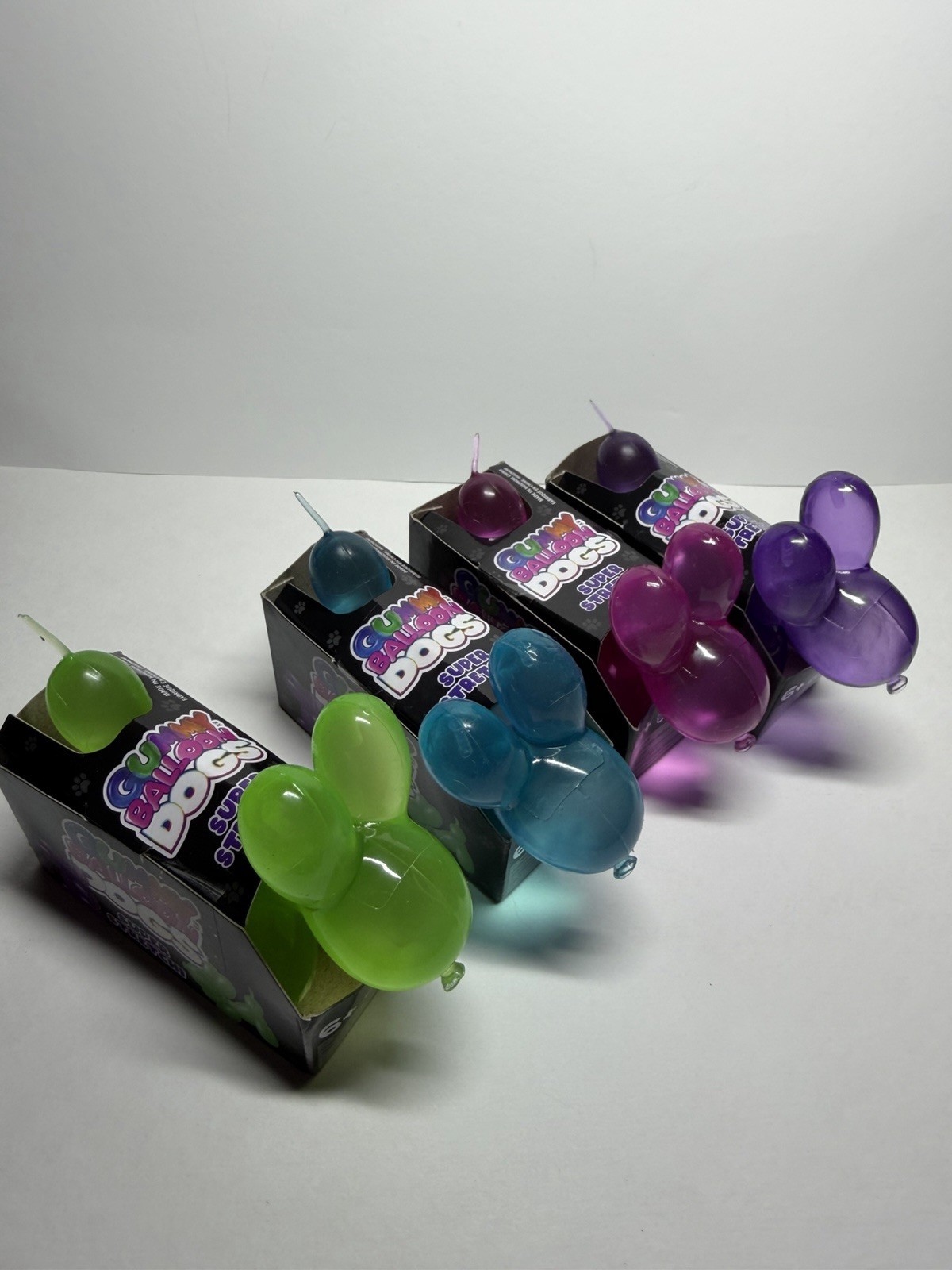 Gummy Balloon Dogs Super Stretchy Toy Blue Pink Purple And Green Set Lot Of 4