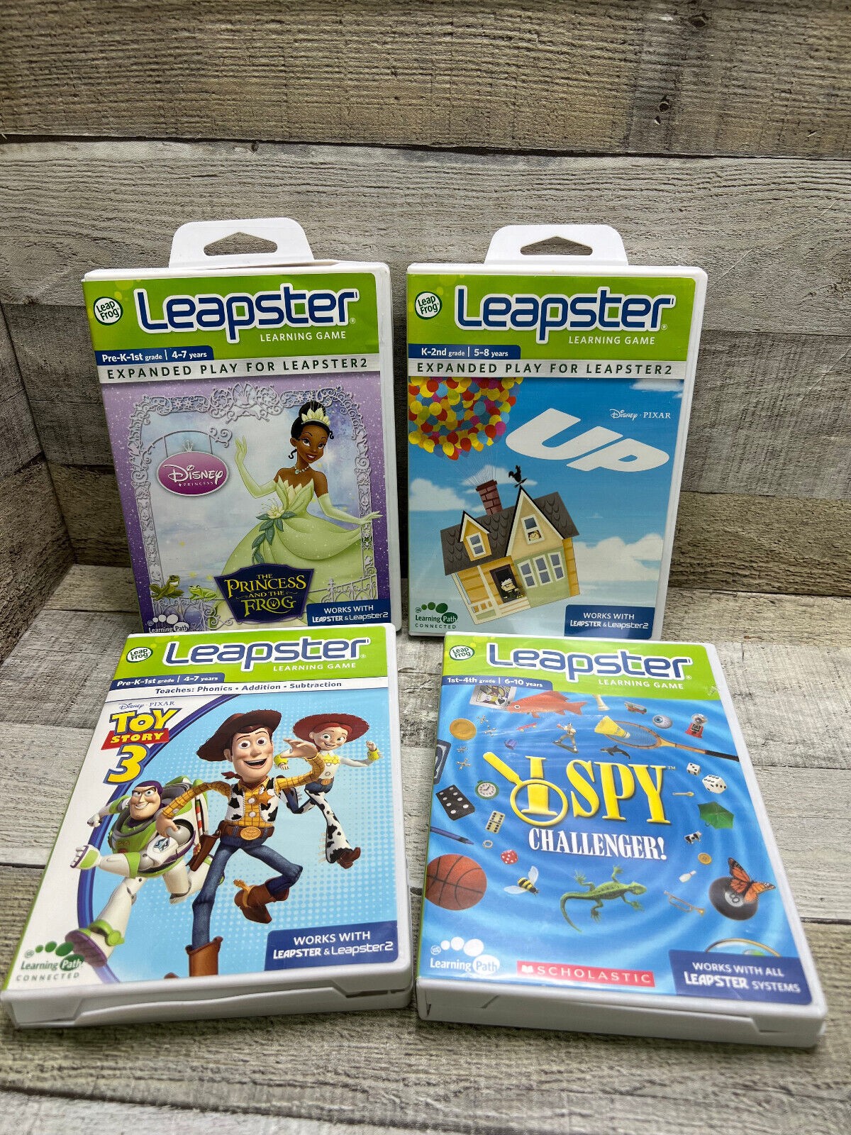 Leapster/2 Learning Games Lot of 4 The princess and frog/UP/toy story/I spy