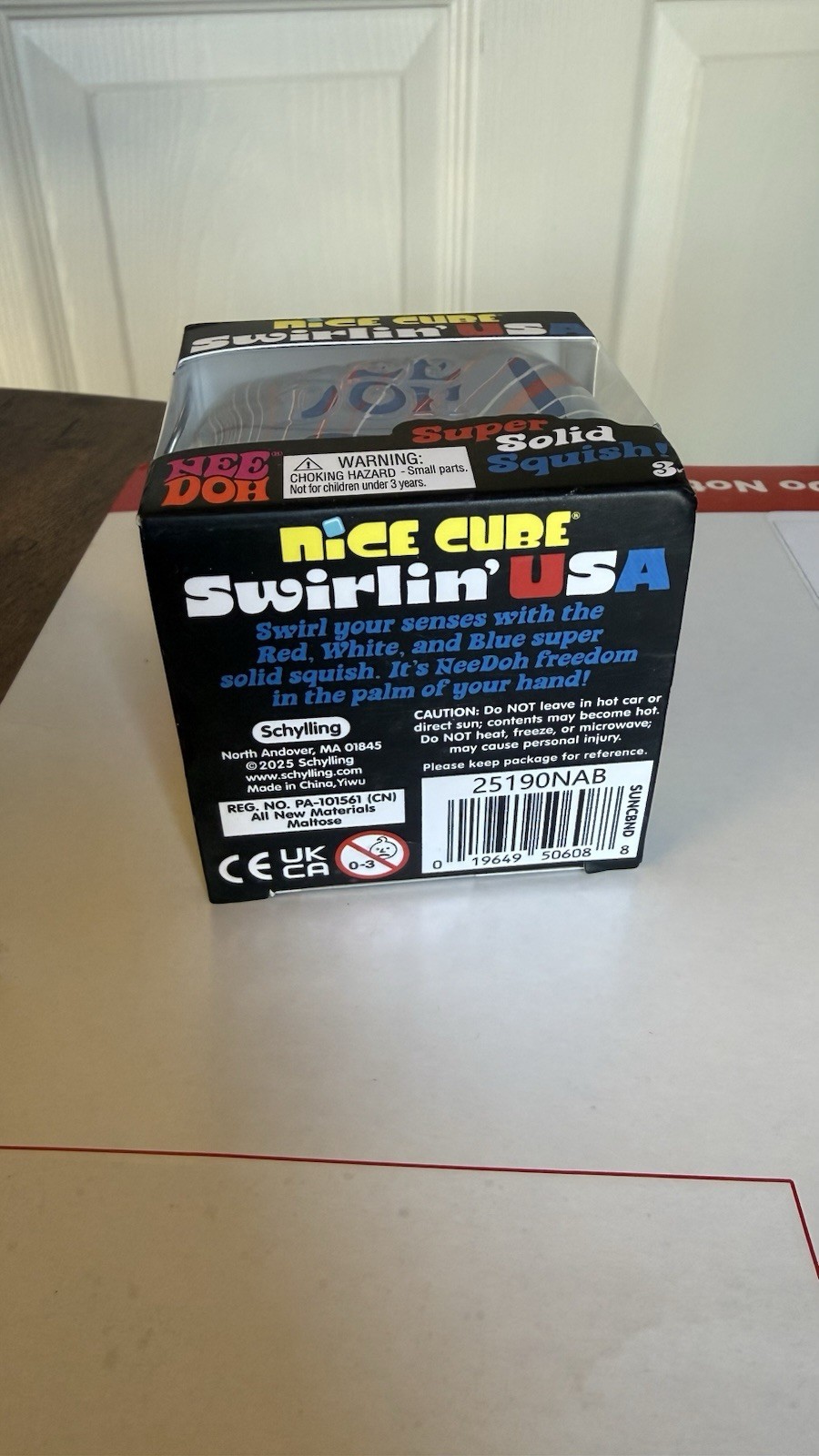 NeeDoh Nice Cube Swirlin’ USA Super Solid Squish Squeeze Toy, Red/White/Blue