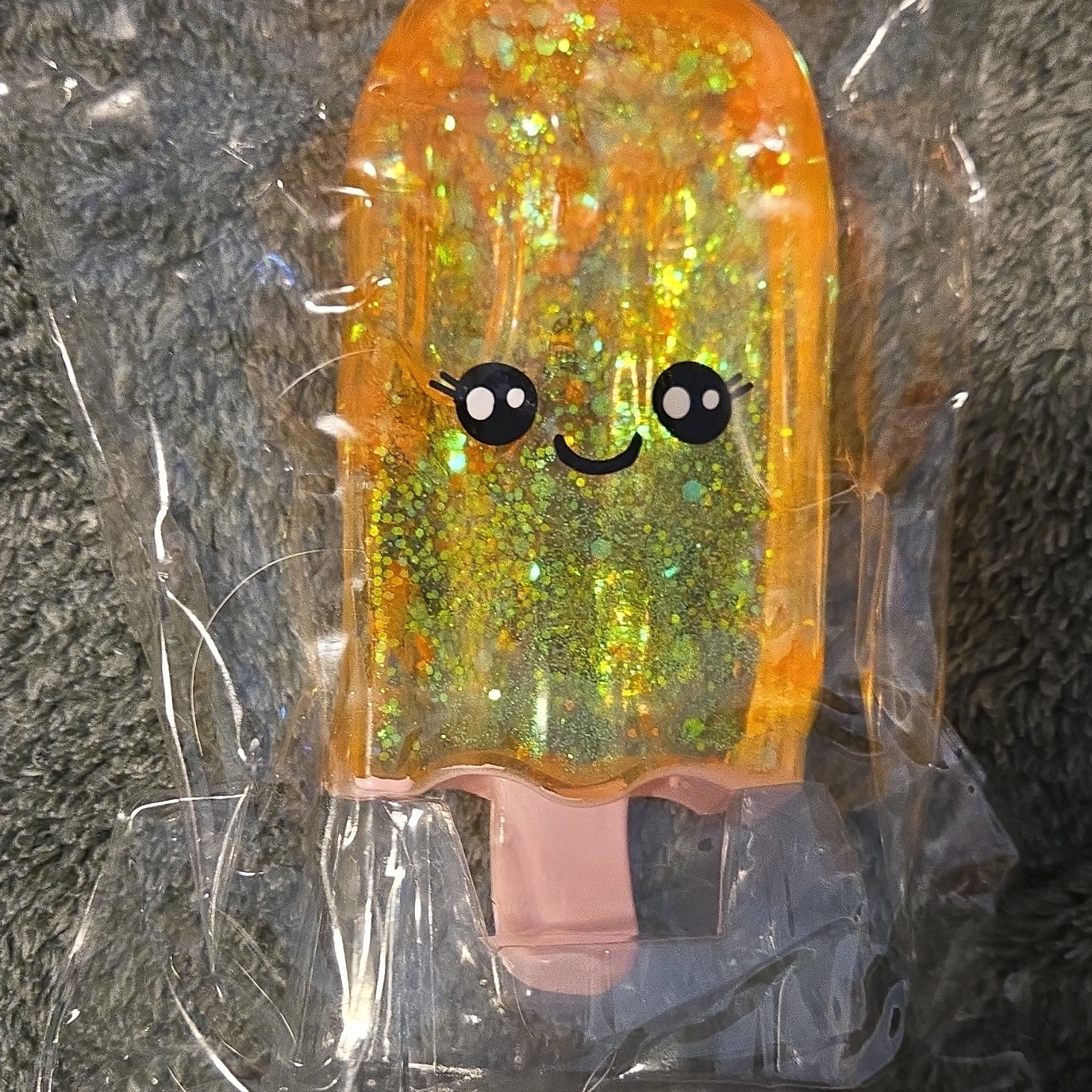 ORB Sugar Swaps Ice Pop Squeeze Squish & Stretch Toy, Orange Gold Glitter
