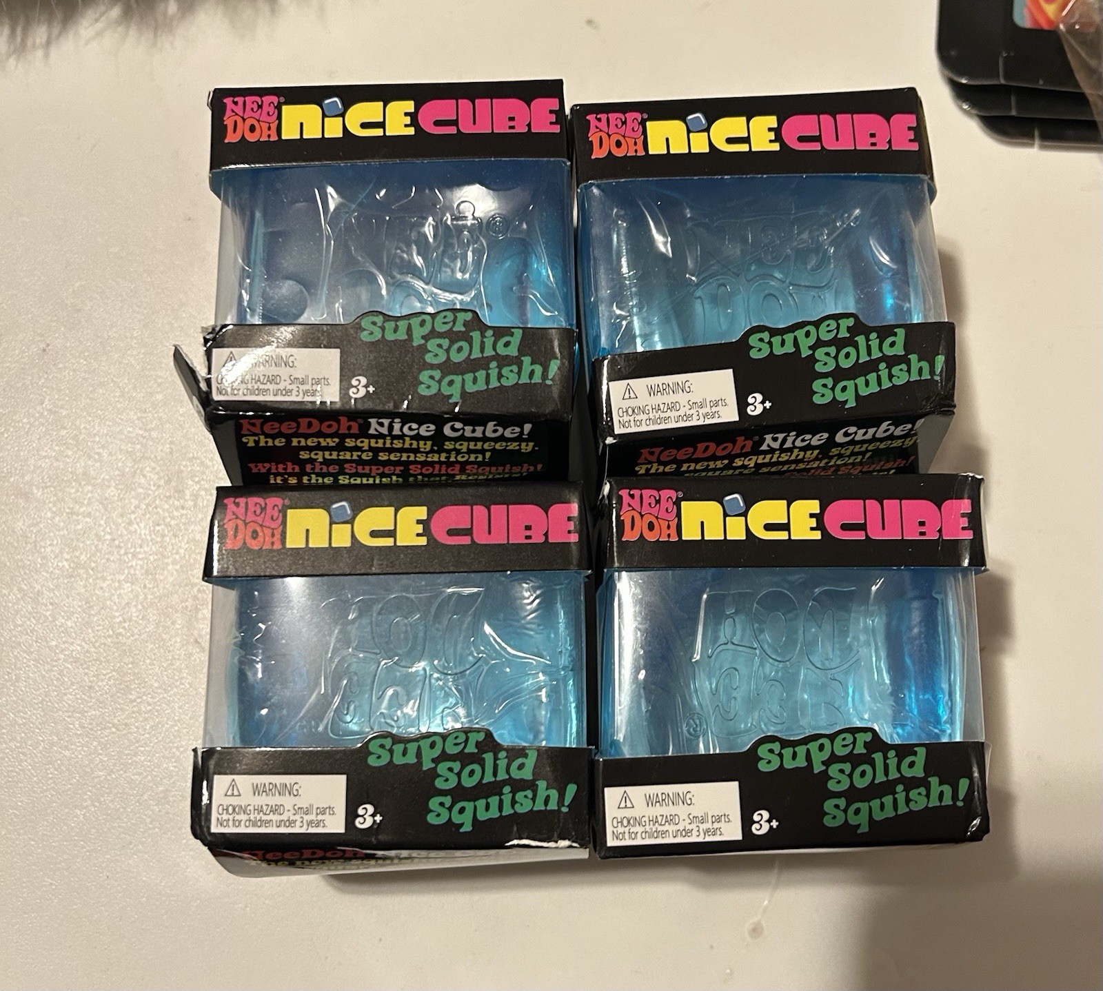 Nee Doh Nice Cube – Super Solid Squish! 4 Pack- 4 New Cubes Colors Vary NeeDoh