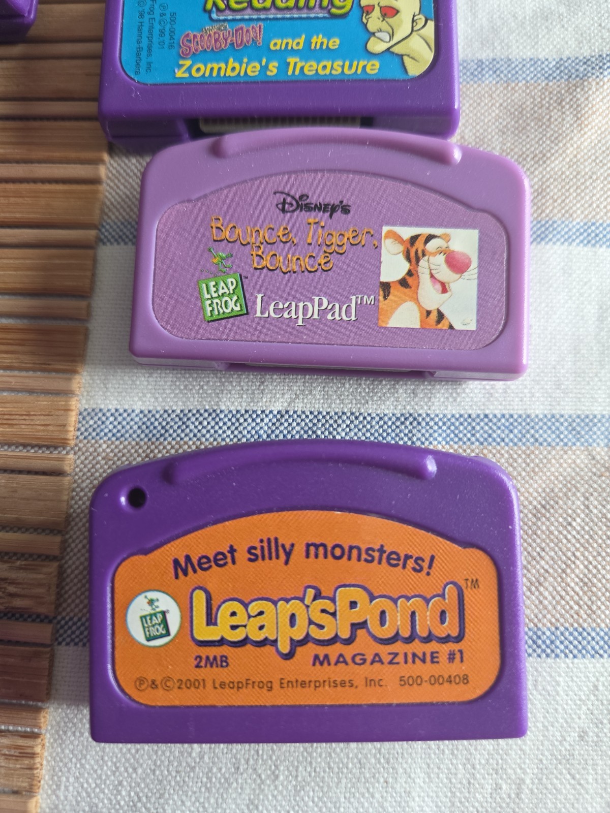 LeapFrog LeapPad Game Cartridges Lot of 24-Lion King, Monsters Inc, Scooby Doo