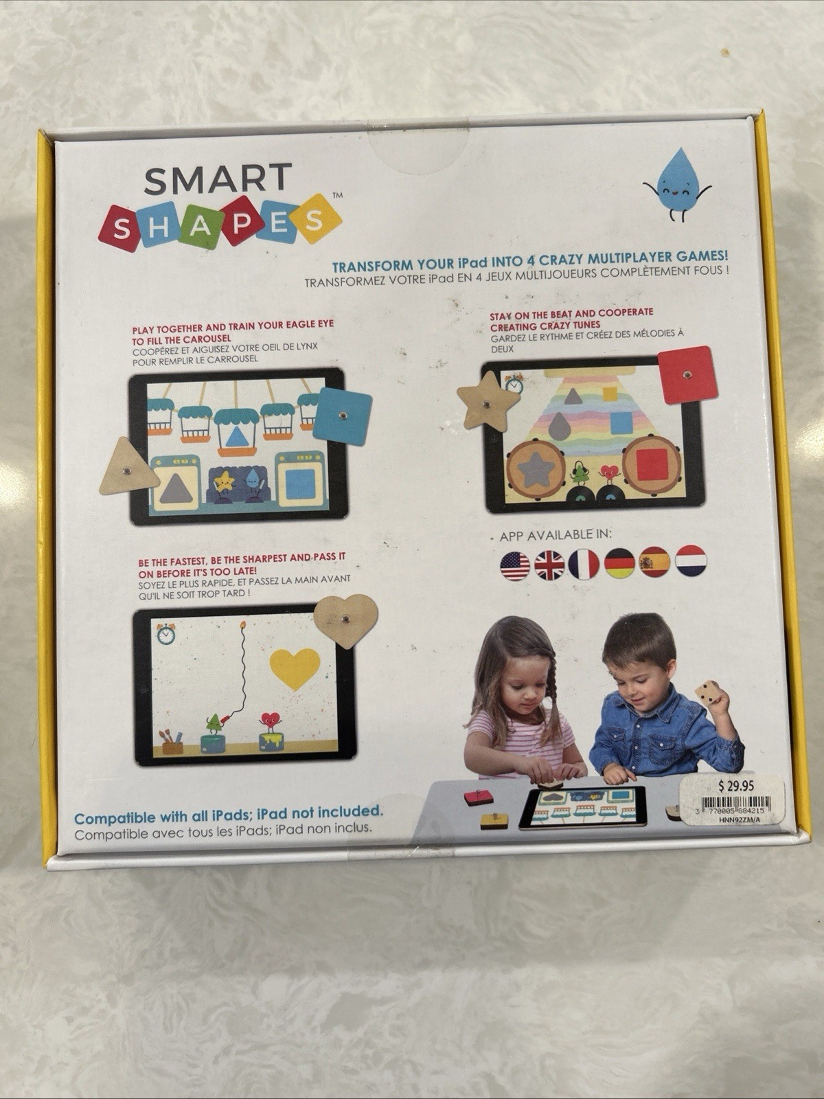 Marbotic Smart Shapes interactive learning toy with physical wooden shapes.