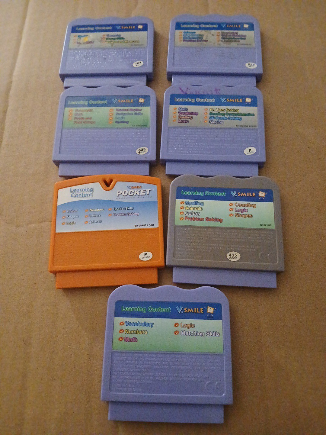 7 Lot VTech V.Smile Game Cartridges Superman Spiderman SpongeBob Scooby Doo