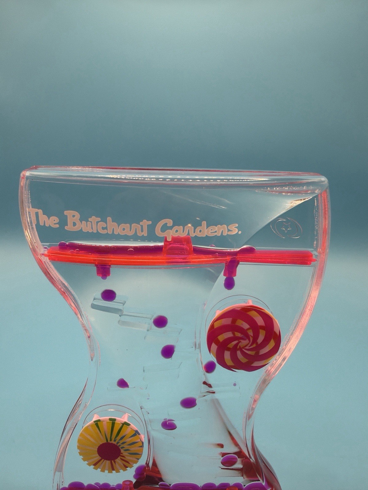 Liquid Motion Bubbler Timer The Butchart Gardens Drip Sensory Toy Pink Purple