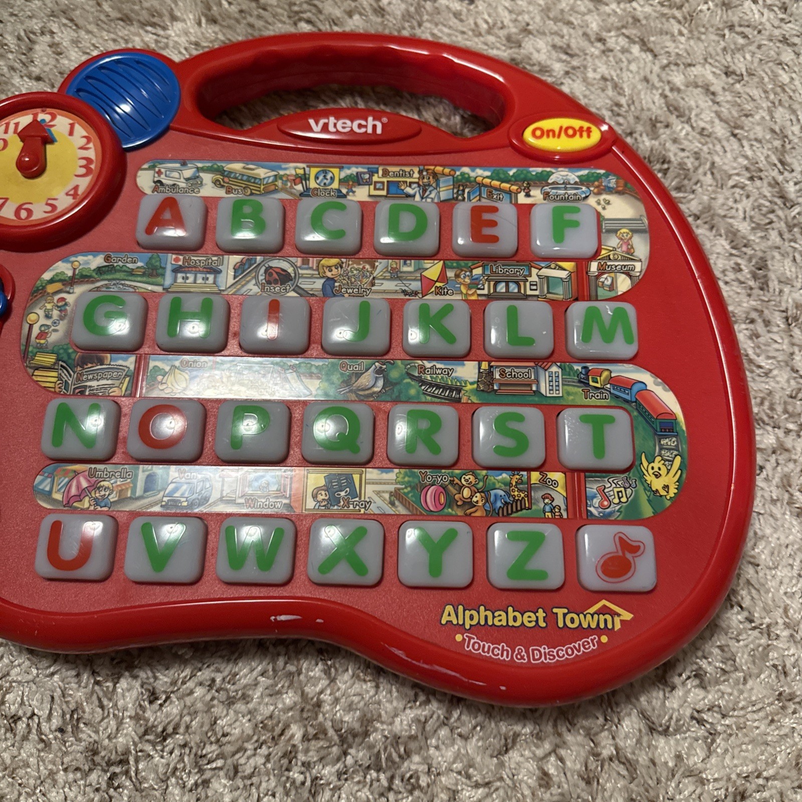 VTech Touch And Discover ALPHABET TOWN: 8 Different Educational Activities Clock