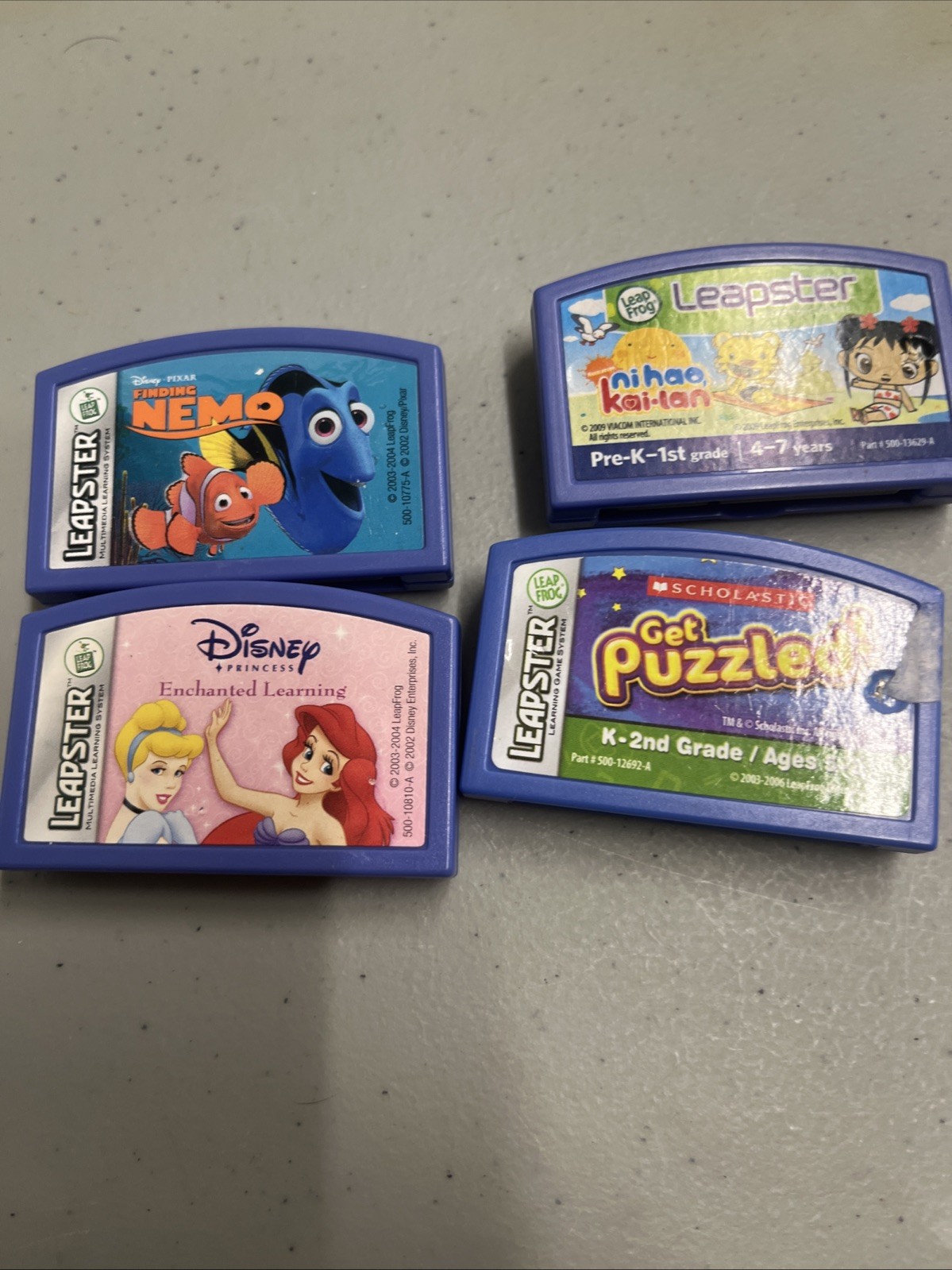 Disney Leapster Leapfrog Game Cartridges Lot- 4 Nemo ,Nihao, Princess,puzzled